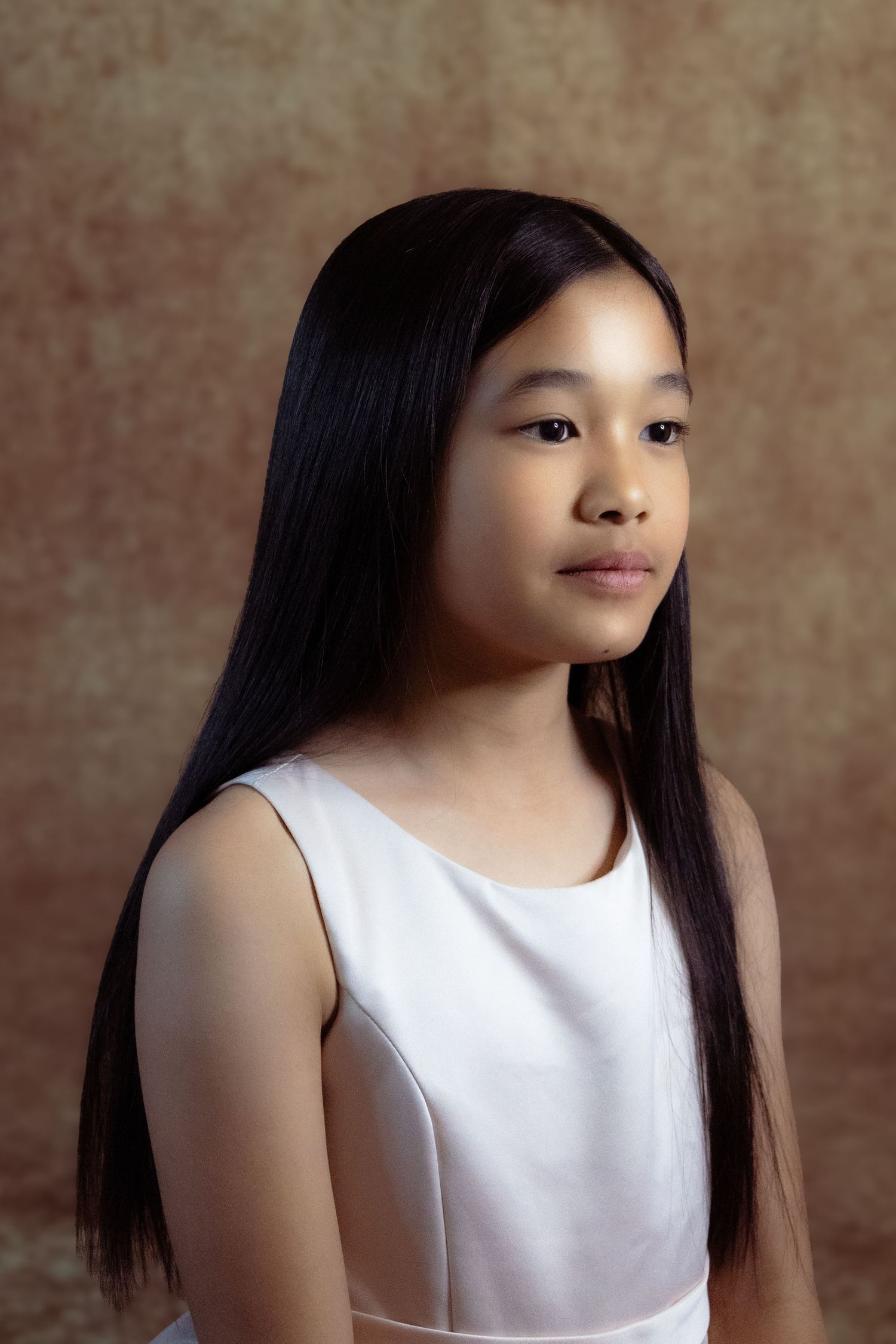 Luxury children fine art portrait session featuring custom styling and studio lighting