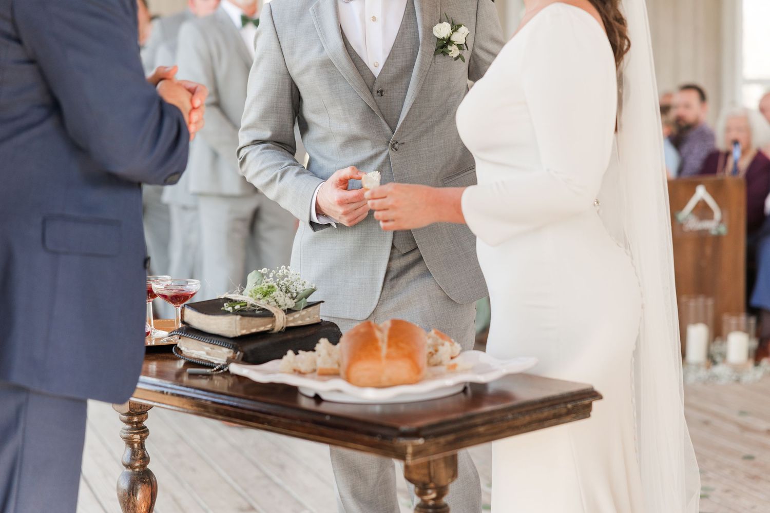 Wedding reception details showing elegant place settings and dining arrangements.