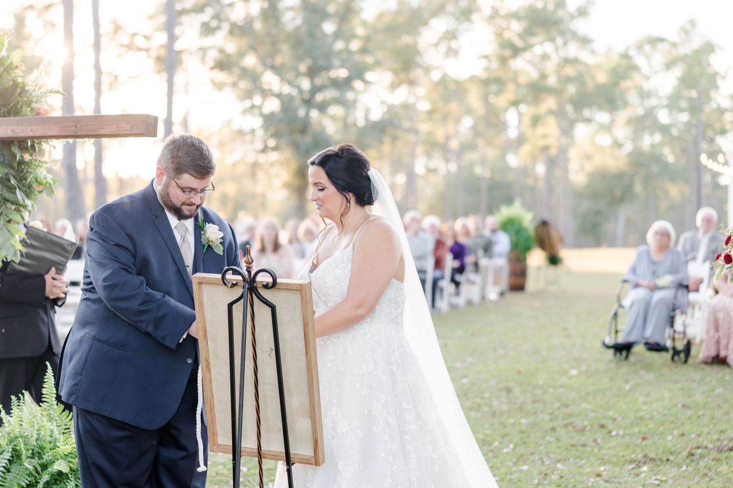 Outdoor wedding ceremony moments captured under natural light with elegant decor.