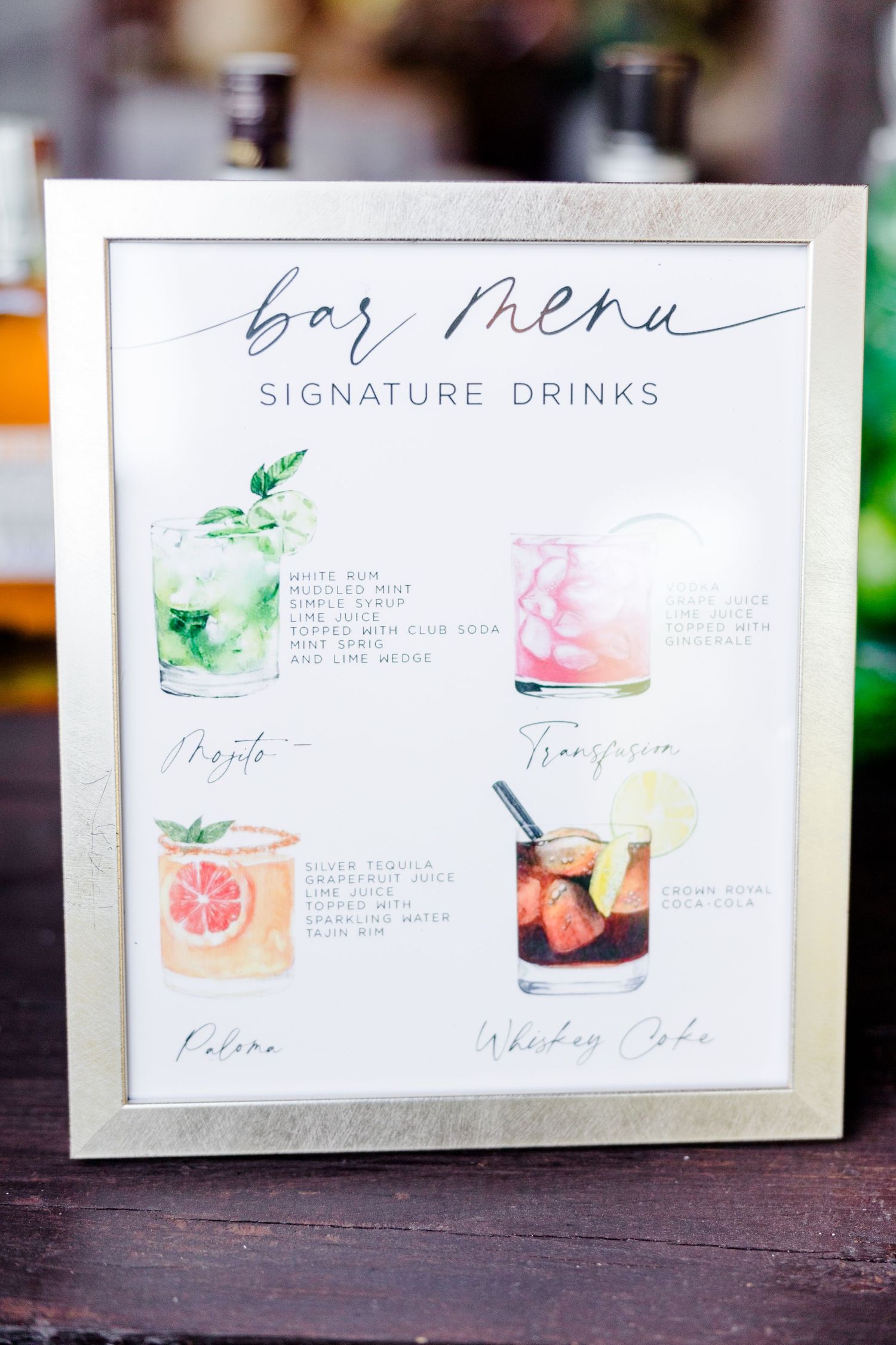 Watercolor wedding bar menu featuring signature cocktail illustrations in soft pastels.