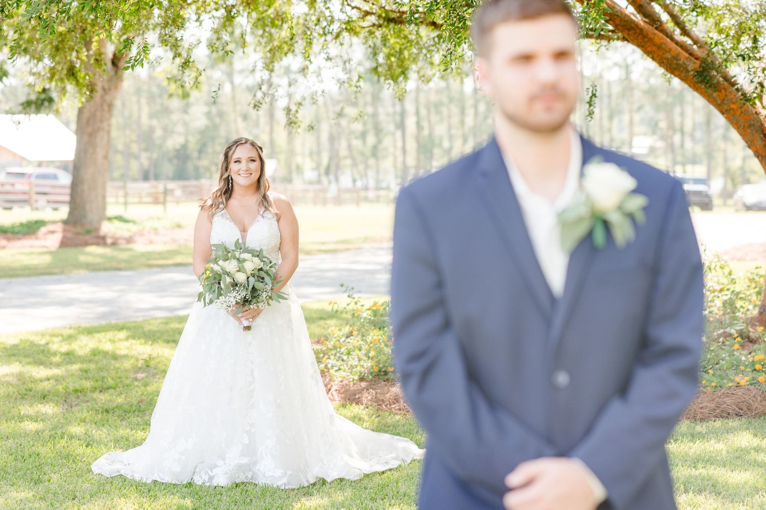 Wedding first look reaction photos captured in a serene garden landscape.