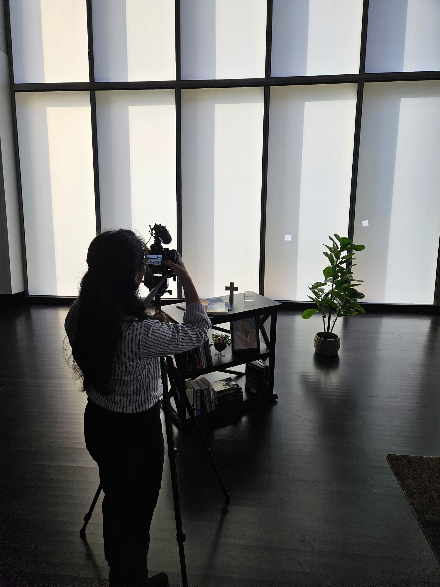 Behind the scenes of Yshia Condezo filming a video for a client.