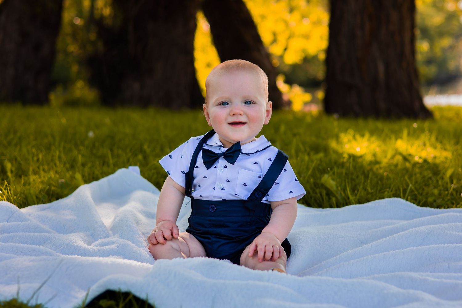 Toddler smiling in their one year milestone session