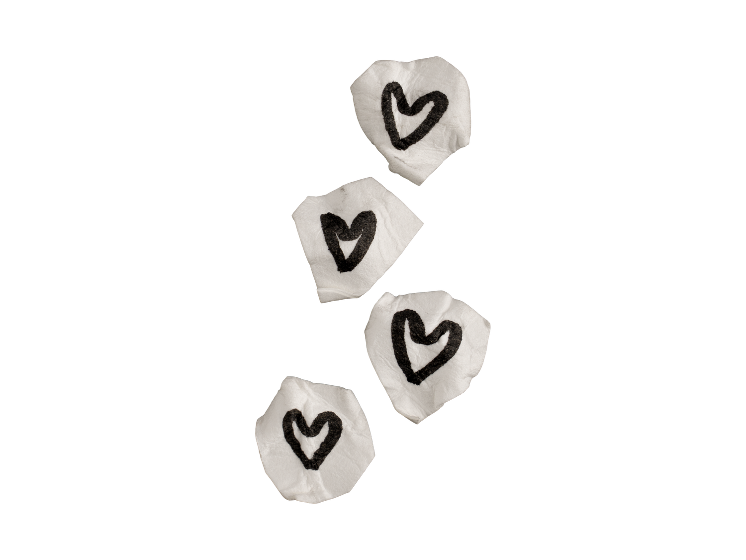 Four silver metallic heart-shaped confetti pieces with black hand-drawn heart outlines.