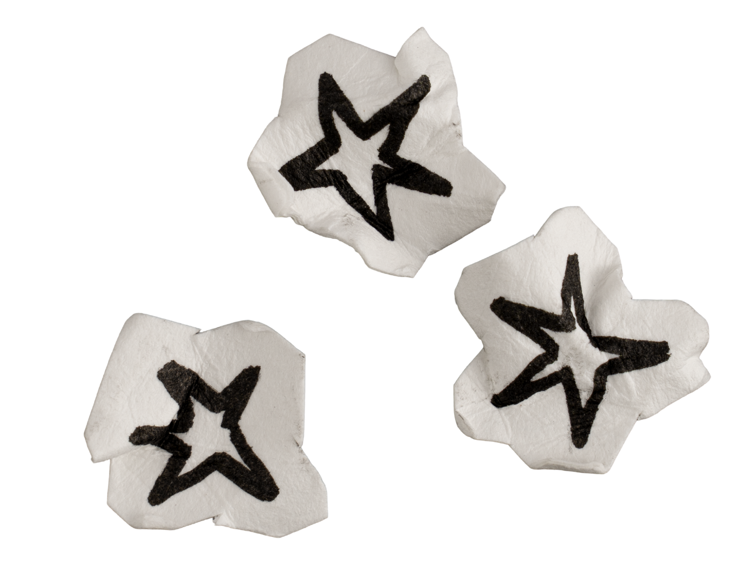 Three silver metallic star-shaped confetti pieces with black hand-drawn star outlines.