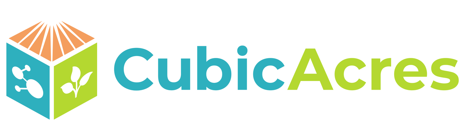 CubicAcres company logo featuring a colorful cube icon with plant and water symbols beside teal text.