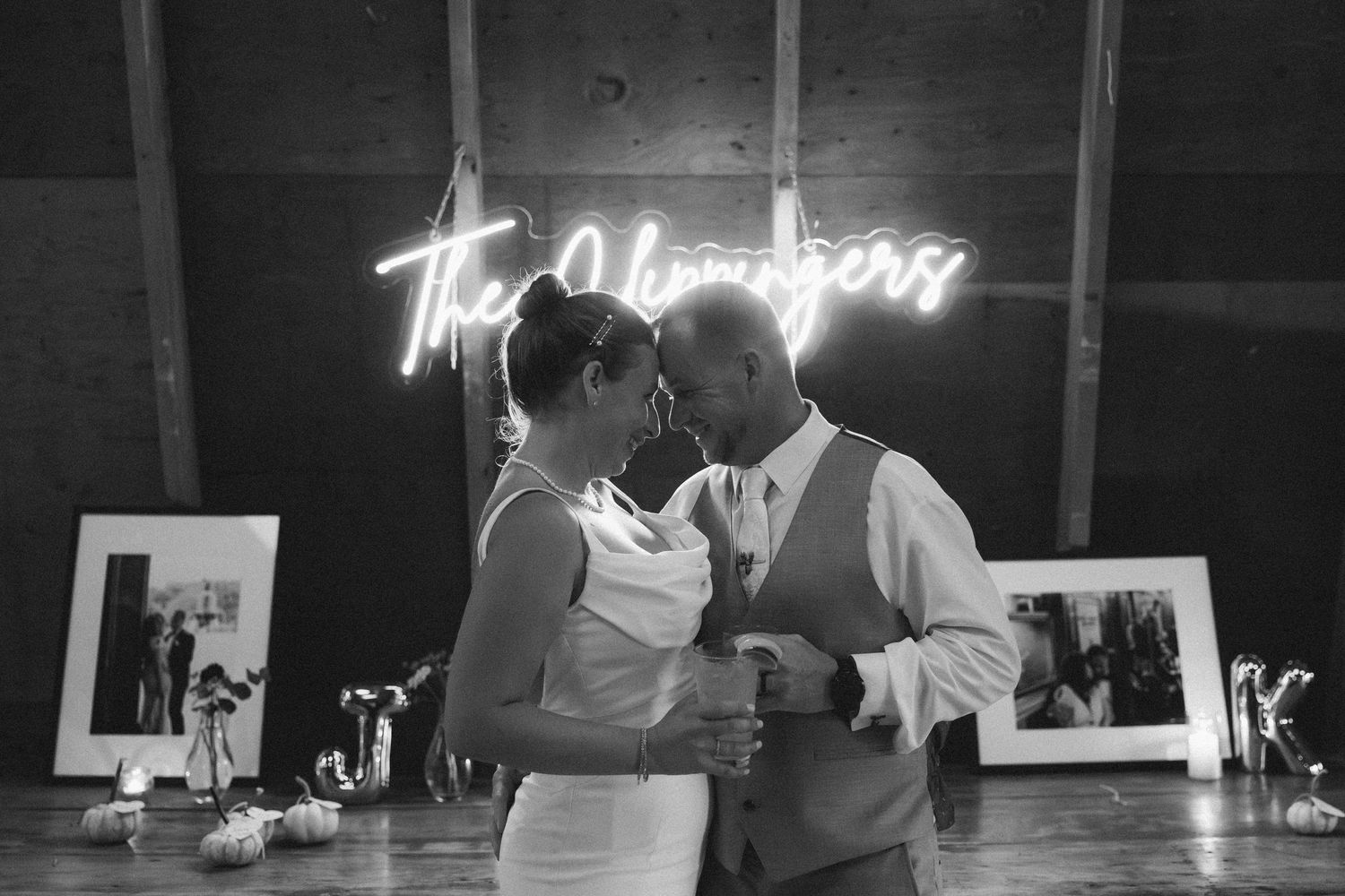 A black and white photo collage shows a romantic wedding reception scene with dancing and intimate moments.