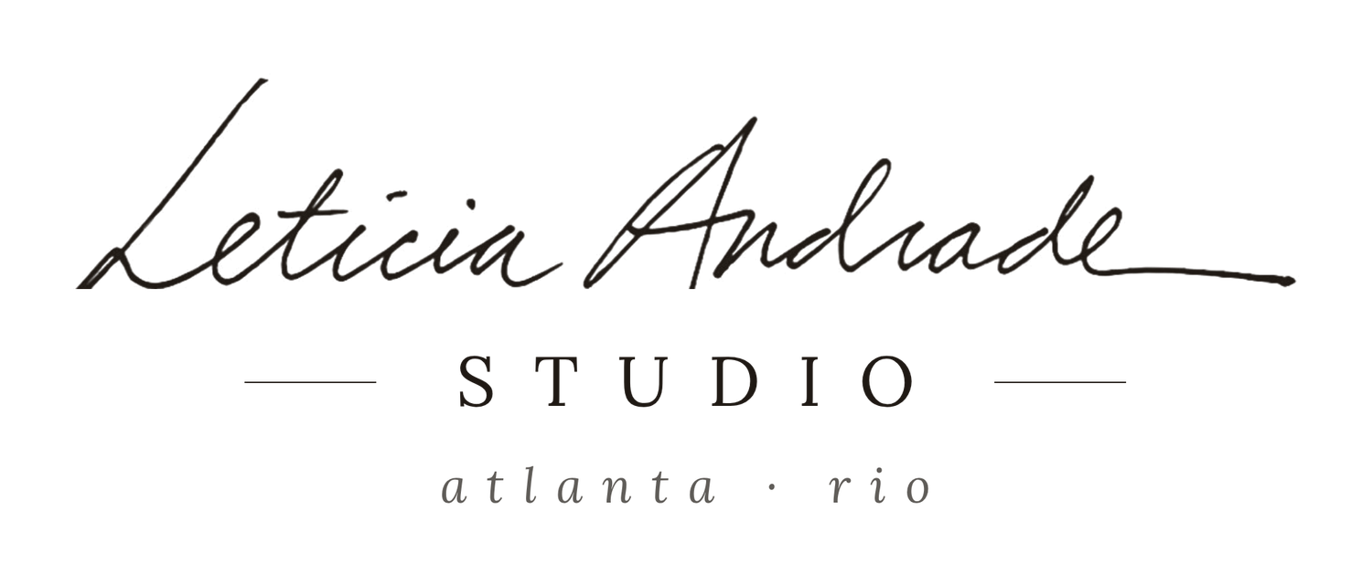 Leticia Andrade Studio logo with elegant script font, Atlanta and Rio locations, minimalist black and white design.