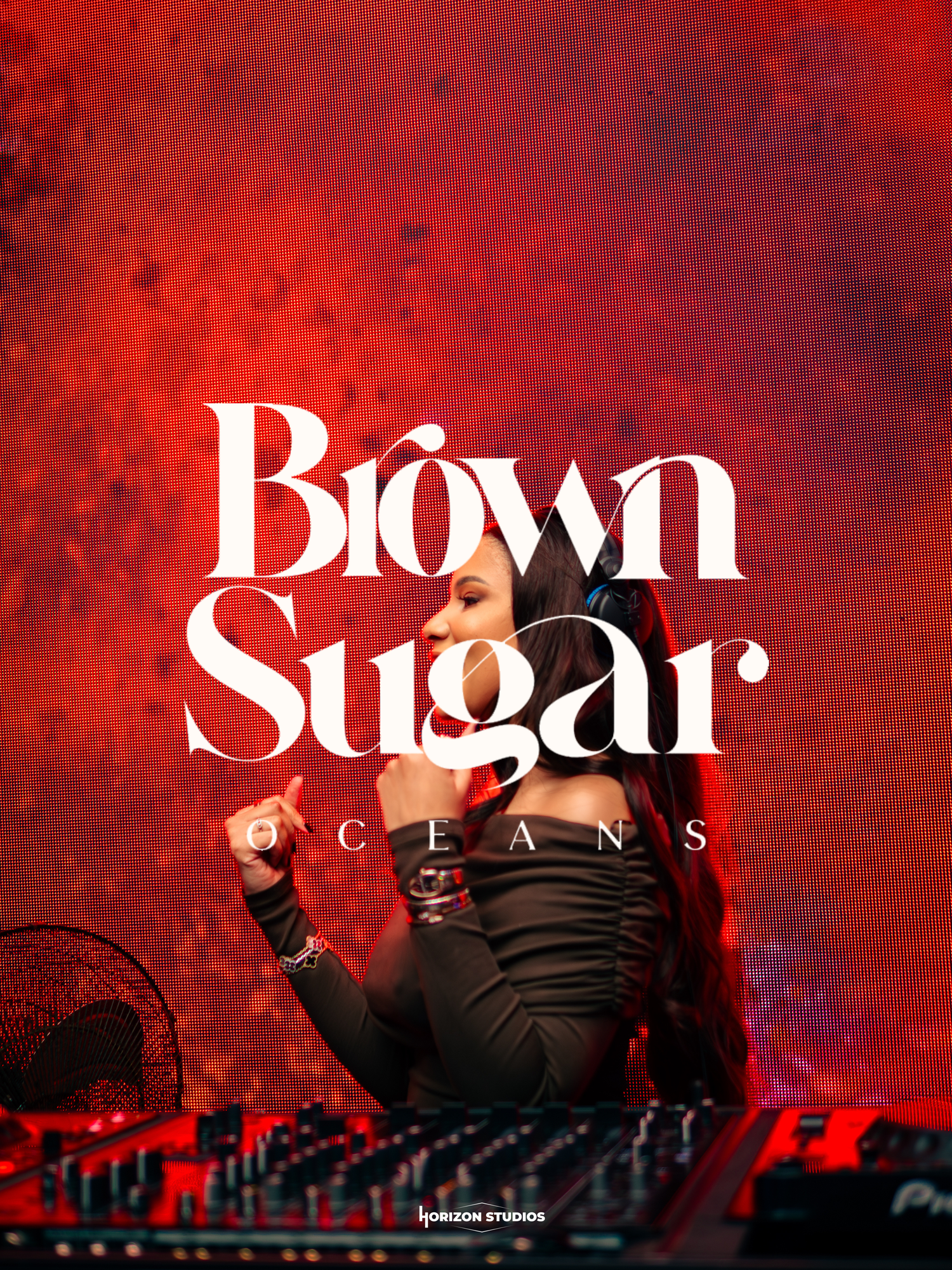 A female DJ performs at Brown Sugar Oceans event by Horizon Studios, set against a vibrant red background.