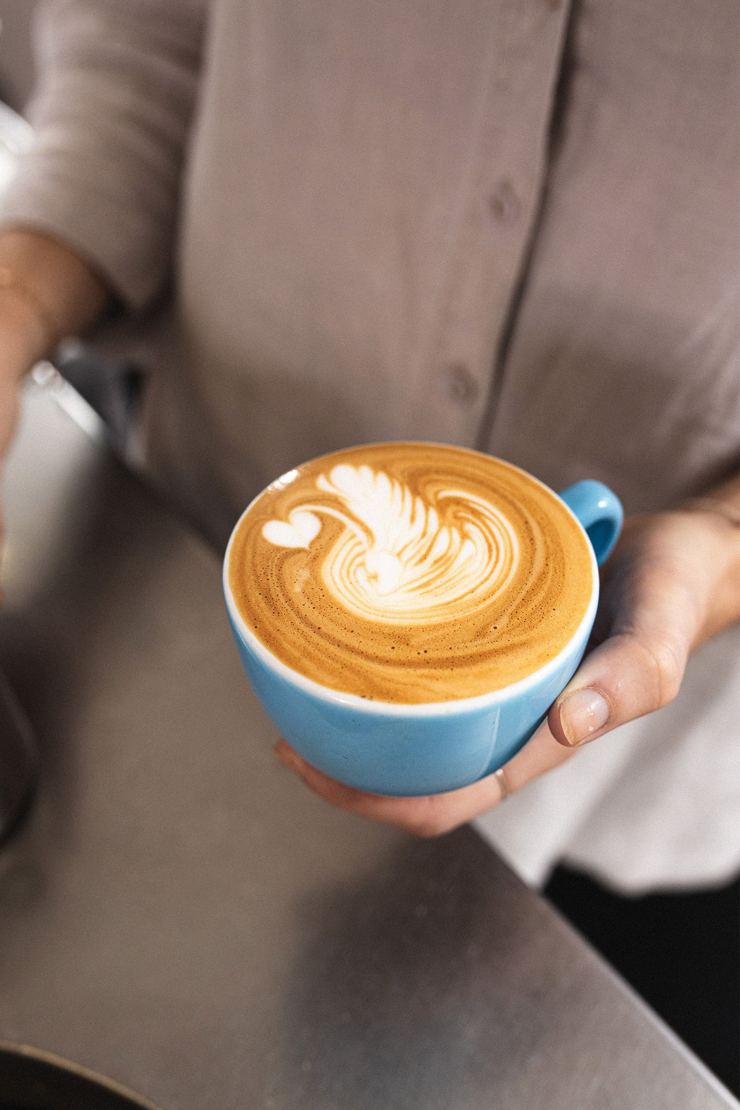 Coffee Latte art, flat white at Daisy Green Food