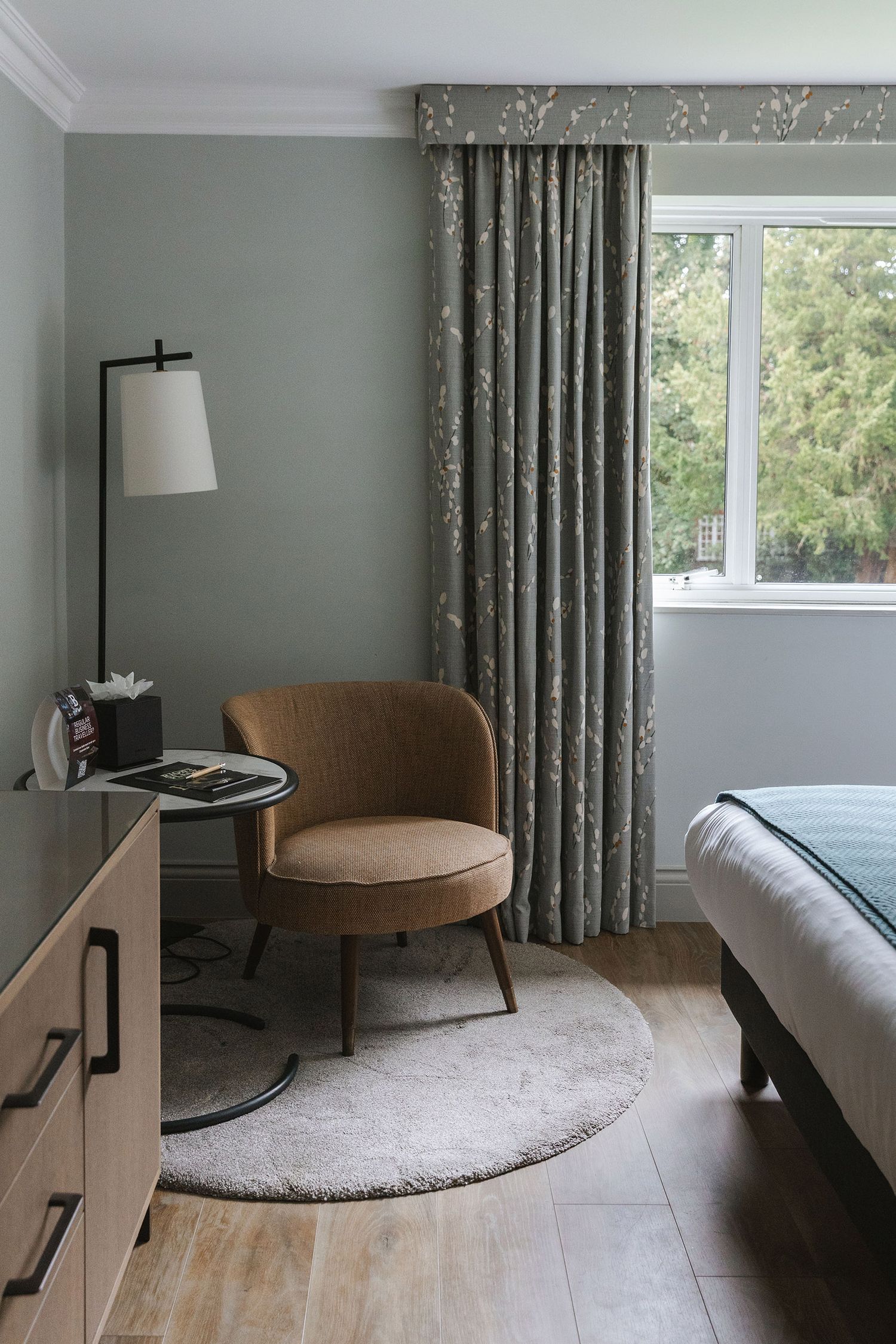 Hotel bedroom interior at Hotel Bush in Farnham with soft natural lighting