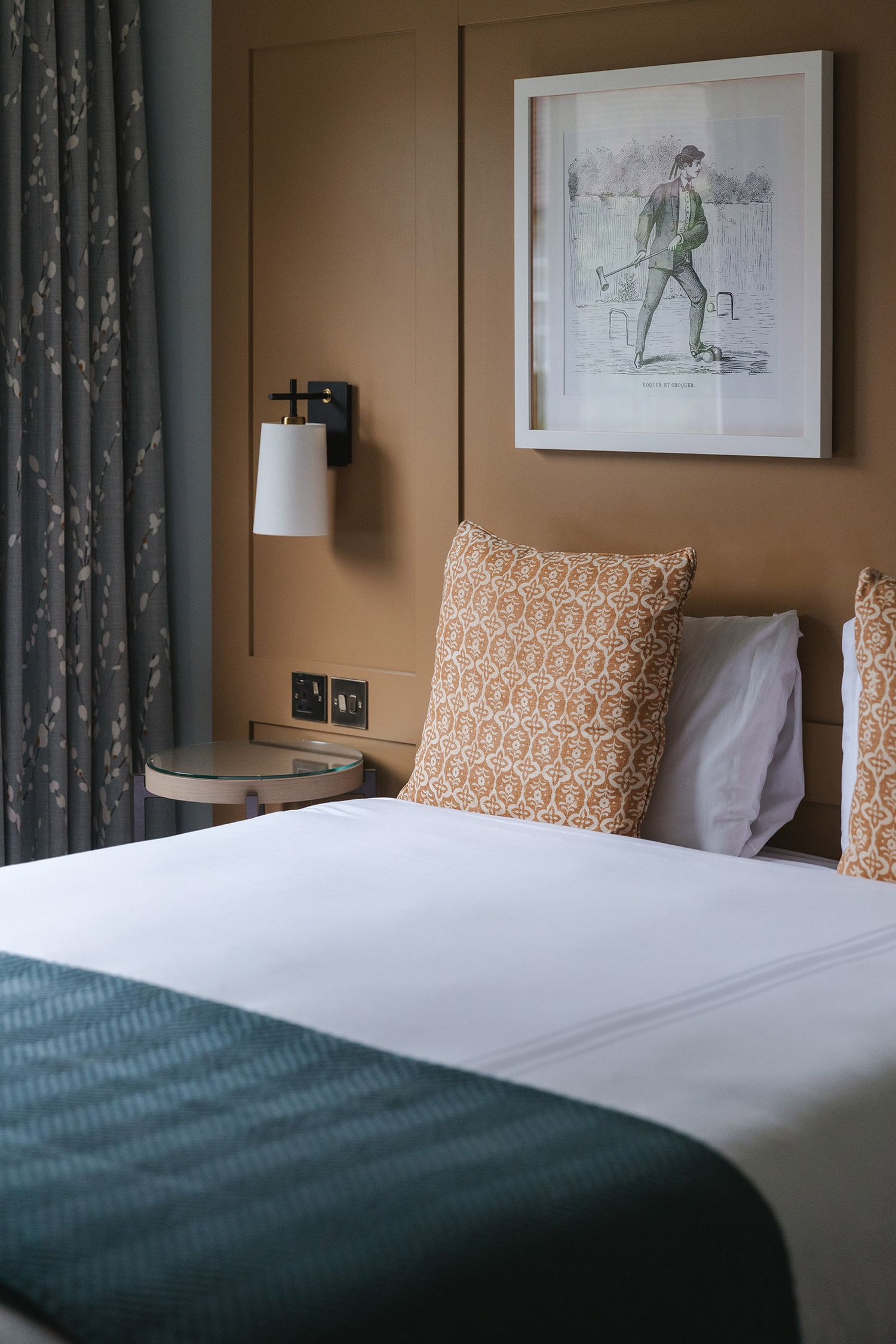 Hotel bedroom interior at Hotel Bush in Farnham with soft natural lighting
