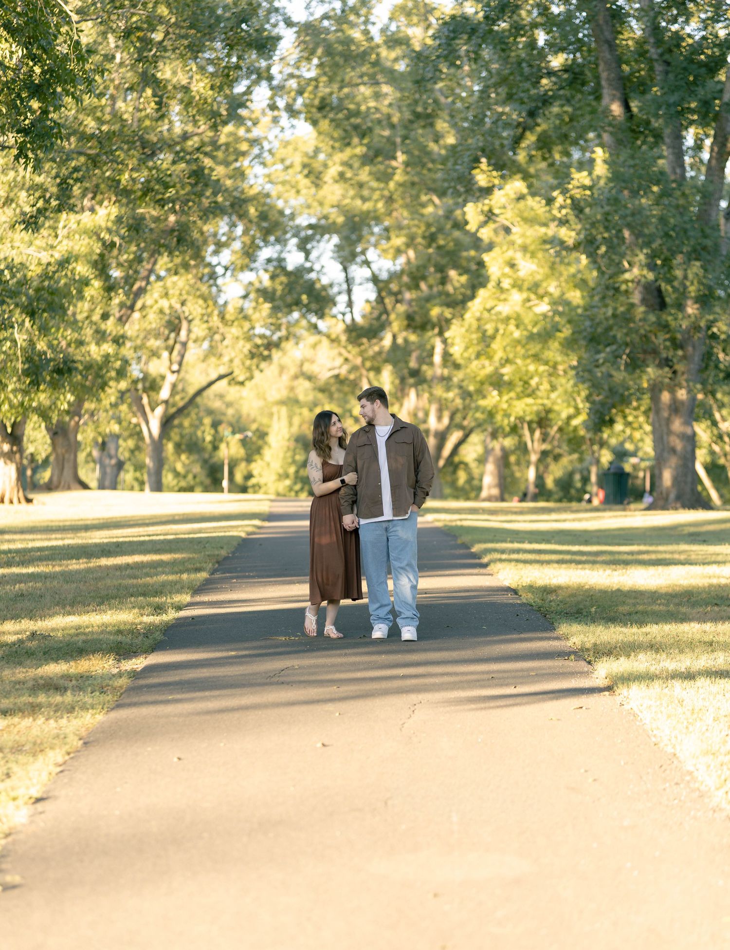 Couple walking in a candid sunset session in north Carolina
