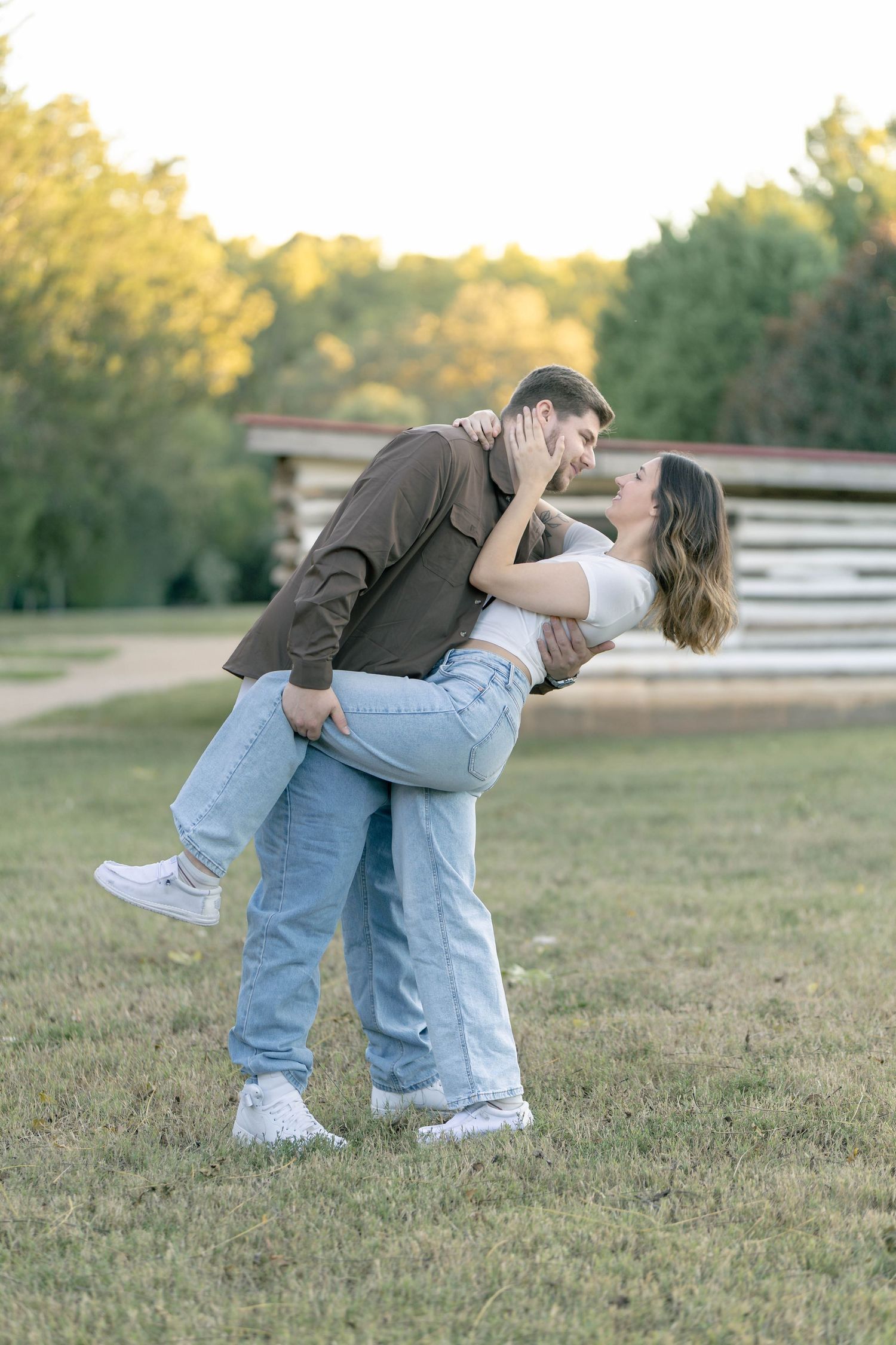 Couple dancing in a candid couple's session at sunset in wake forest north Carolina