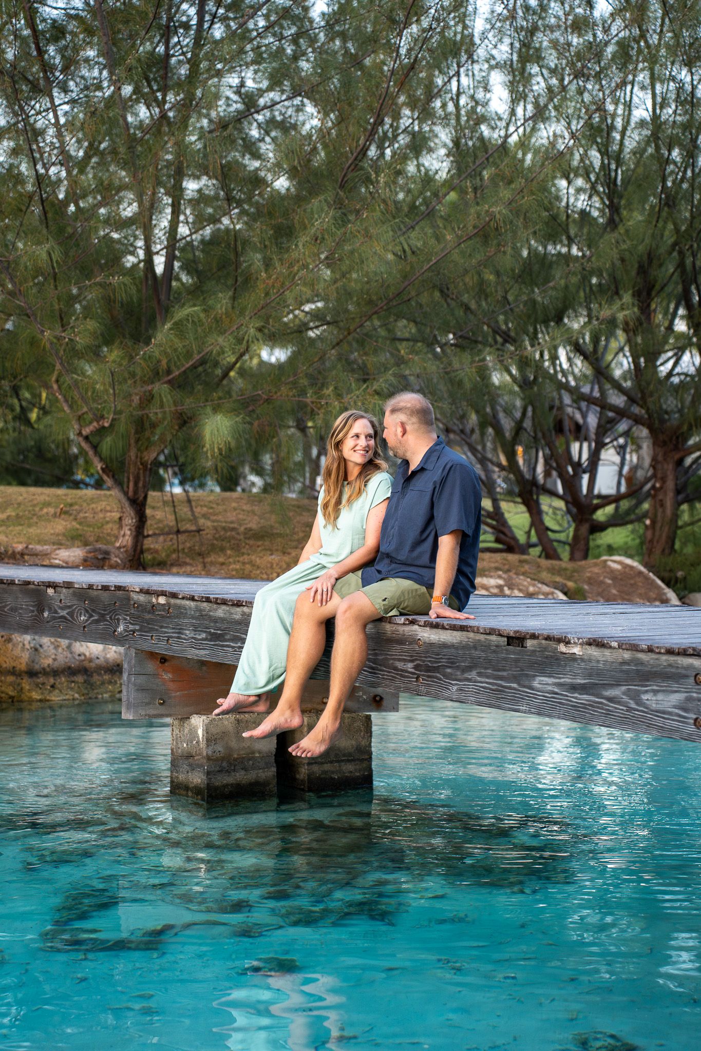 Couple portrait by the pool during a Bora Bora photoshoot in French Polynesia