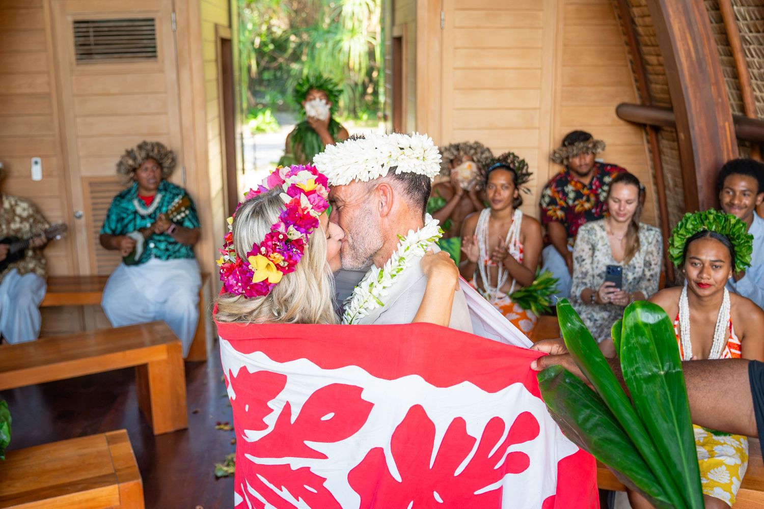 Traditional Polynesian wedding ceremony with family and guests in Bora Bora