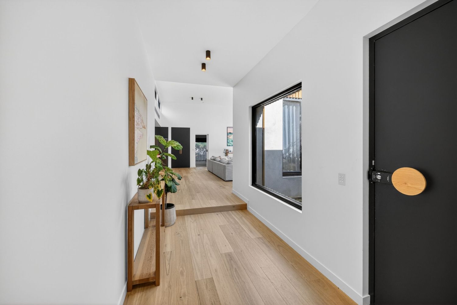 Front entryway showcasing a welcoming architectural entrance with considered design details, natural light