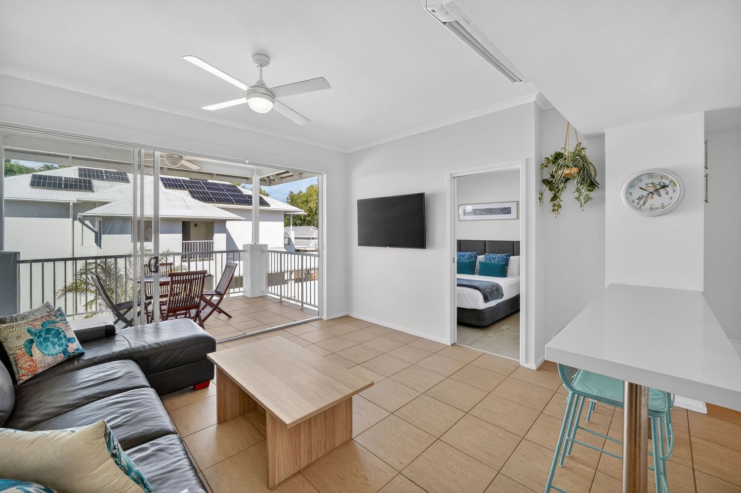 Holiday apartment living room featuring relaxed, modern styling, comfortable furnishings, and bright natural light in a welcoming space.