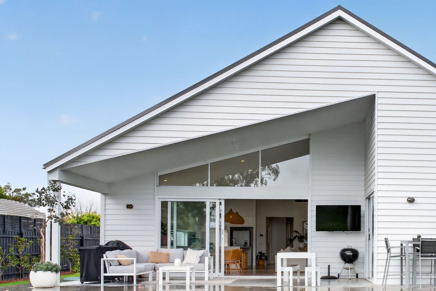 Exterior architectural image focusing on roofline design, highlighting structure, form, and clean detailing of the roof against the building