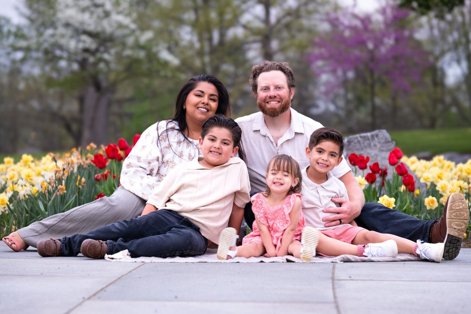 family among tulips at Founders Hall in Hershey, PA