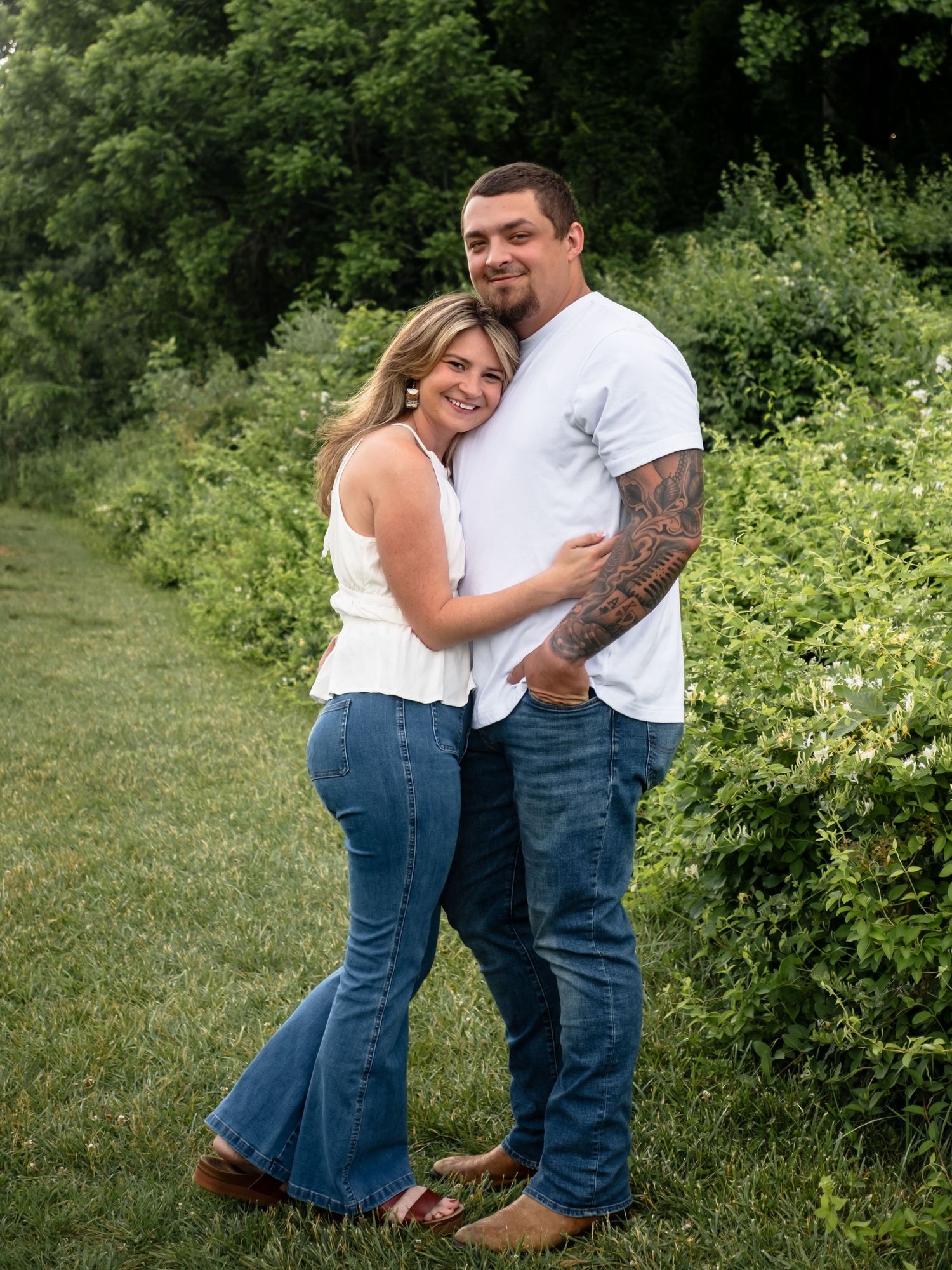 couple hugging at middle creek in Lancaster, PA