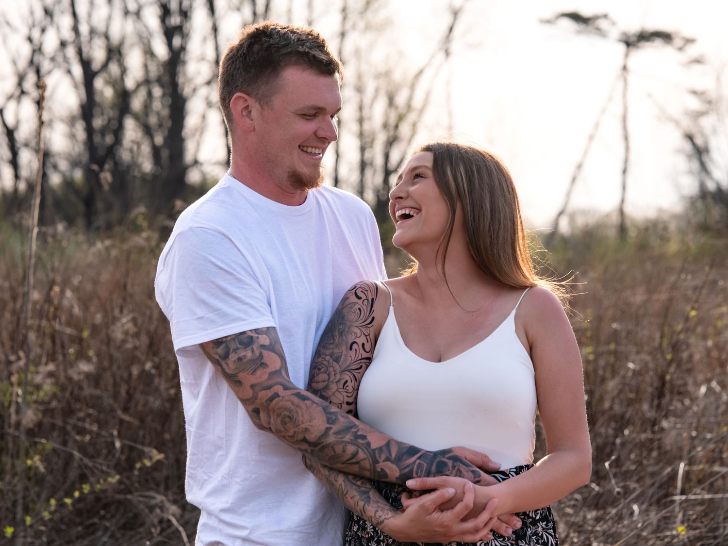 couple laughing during golden hour