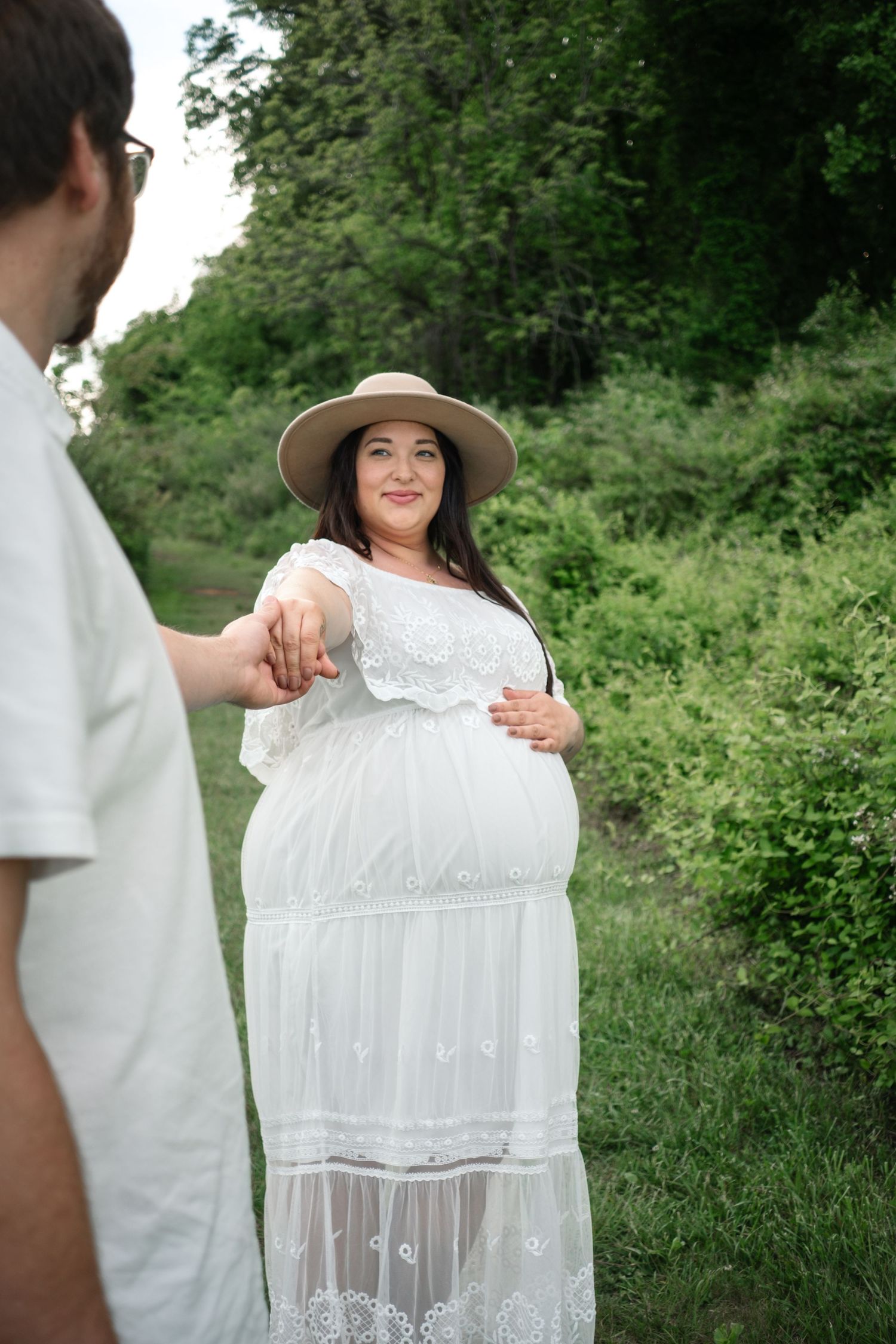 father admiring pregnant wife in Lancaster, Pennsylvania