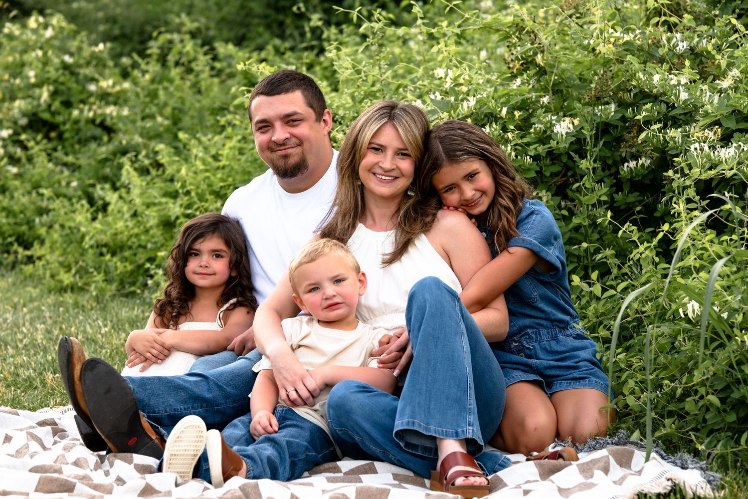 family posing at middle creek