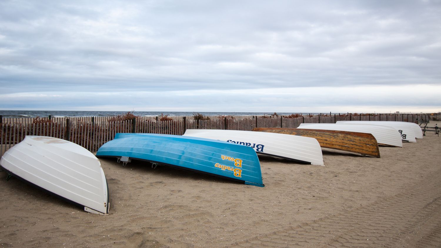 Boats line the beach during winter on the New Jersey shore