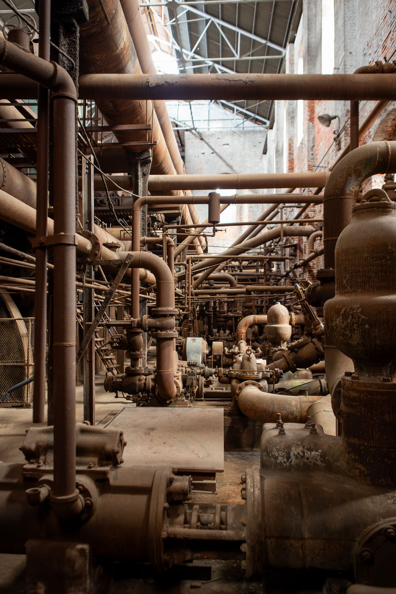 An interior scene in an abandoned iron mill