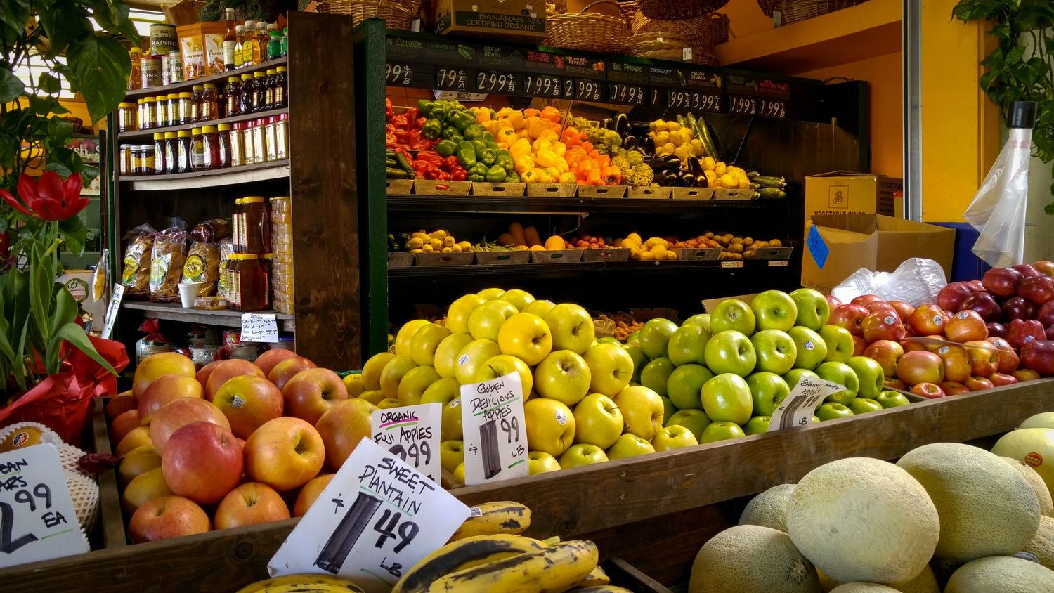 A fruit stand at a farmers market