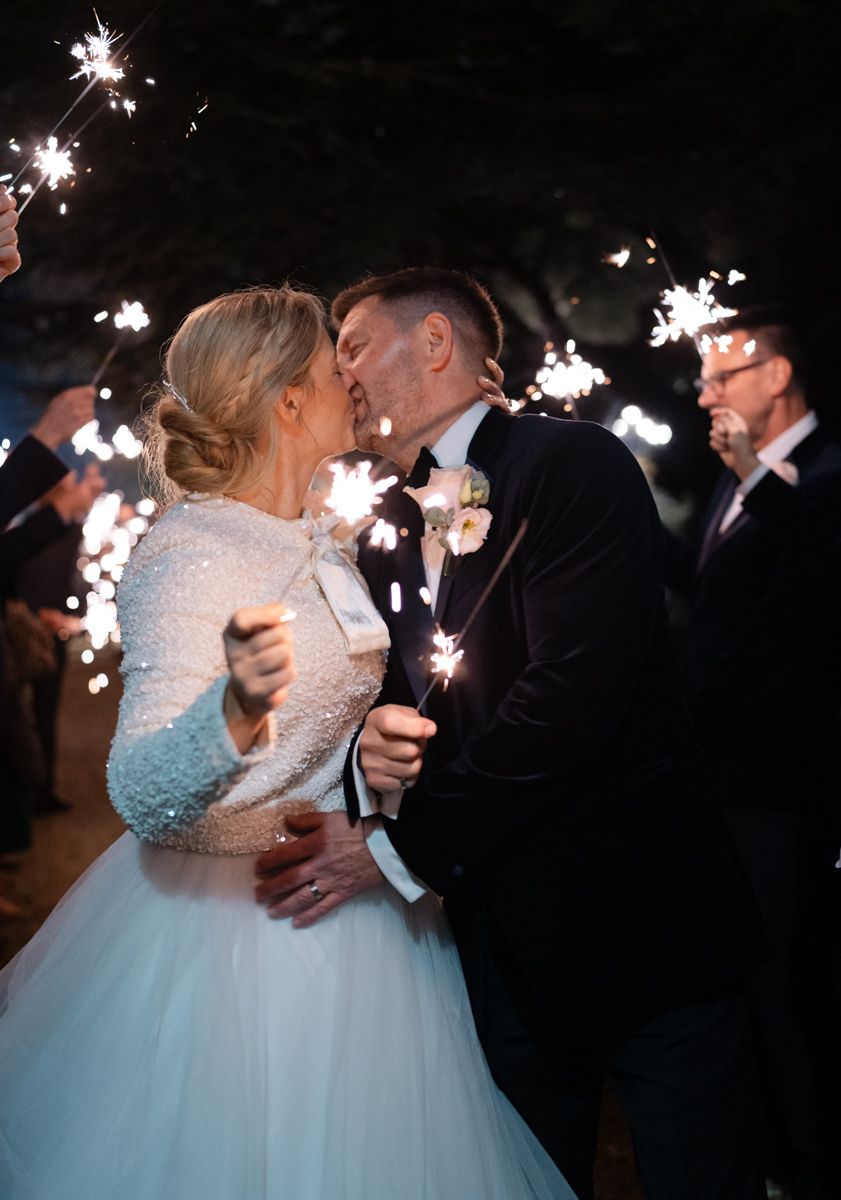 Sparkle couple entrance - editorial wedding photography Cheshire