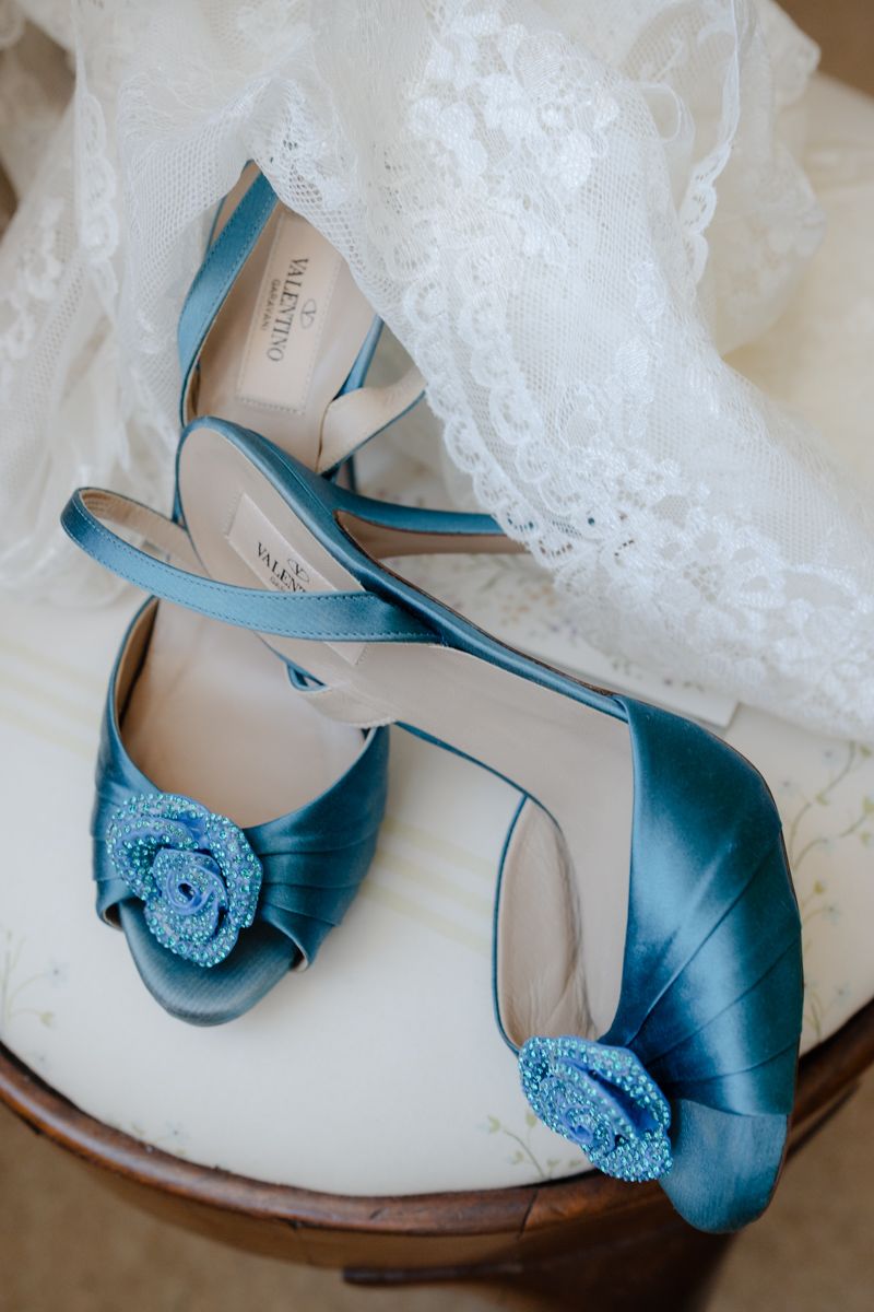 Something blue bridal details - blue Valentino shoes with delicate veil, editorial wedding photography Cheshire
