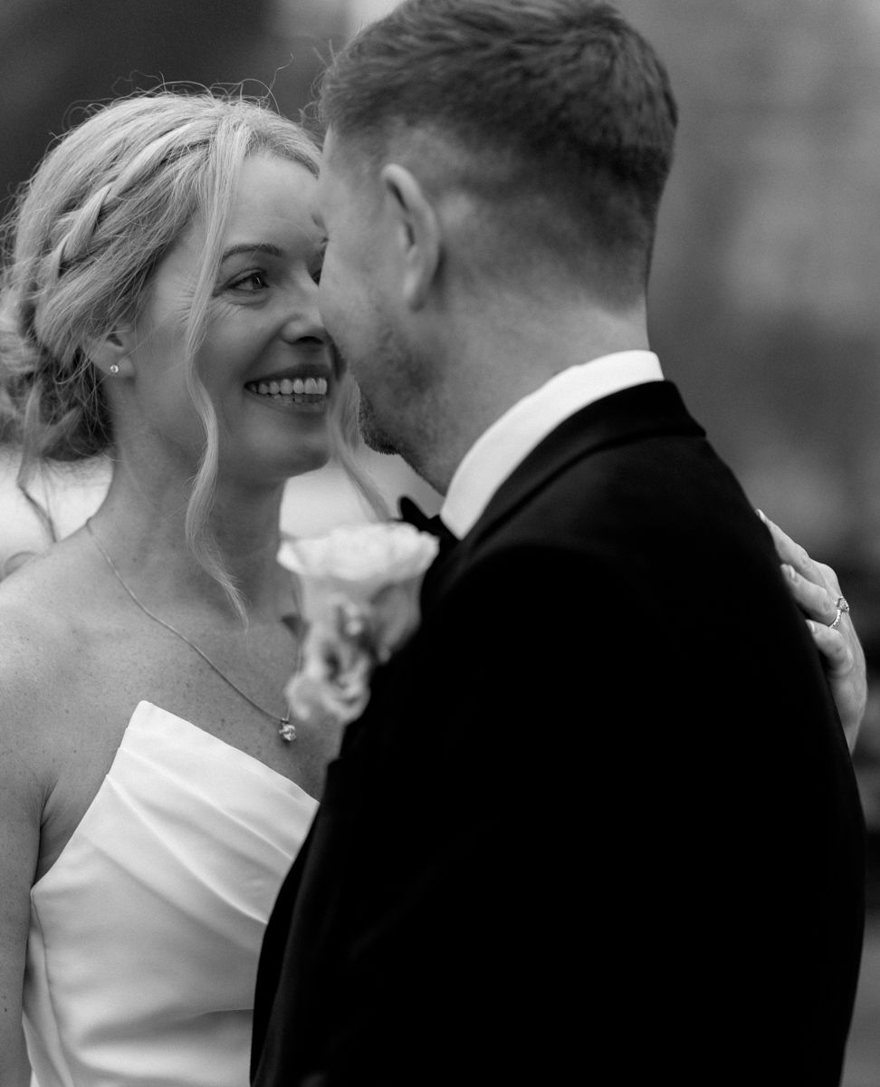 Bride and groom close up portrait - candid wedding photography London