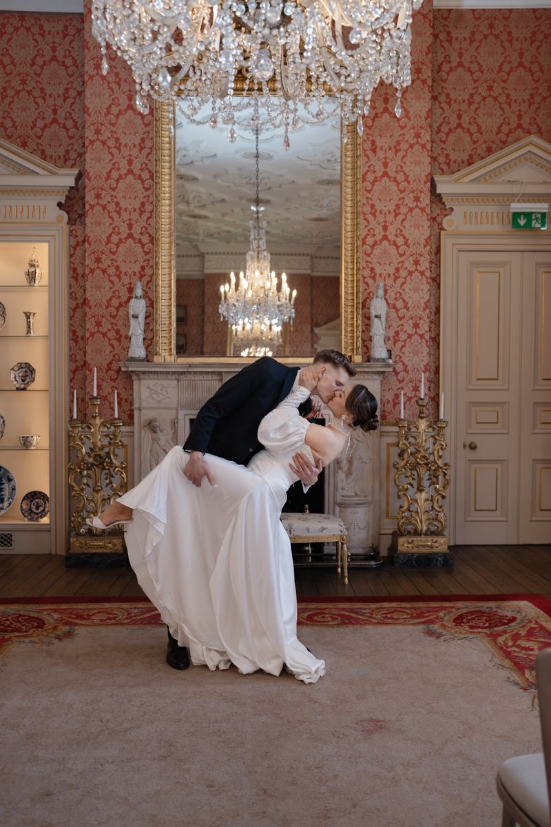 Bridal deep kiss portrait in Capesthorne Hall in Cheshire - editorial wedding photographer in Cheshire