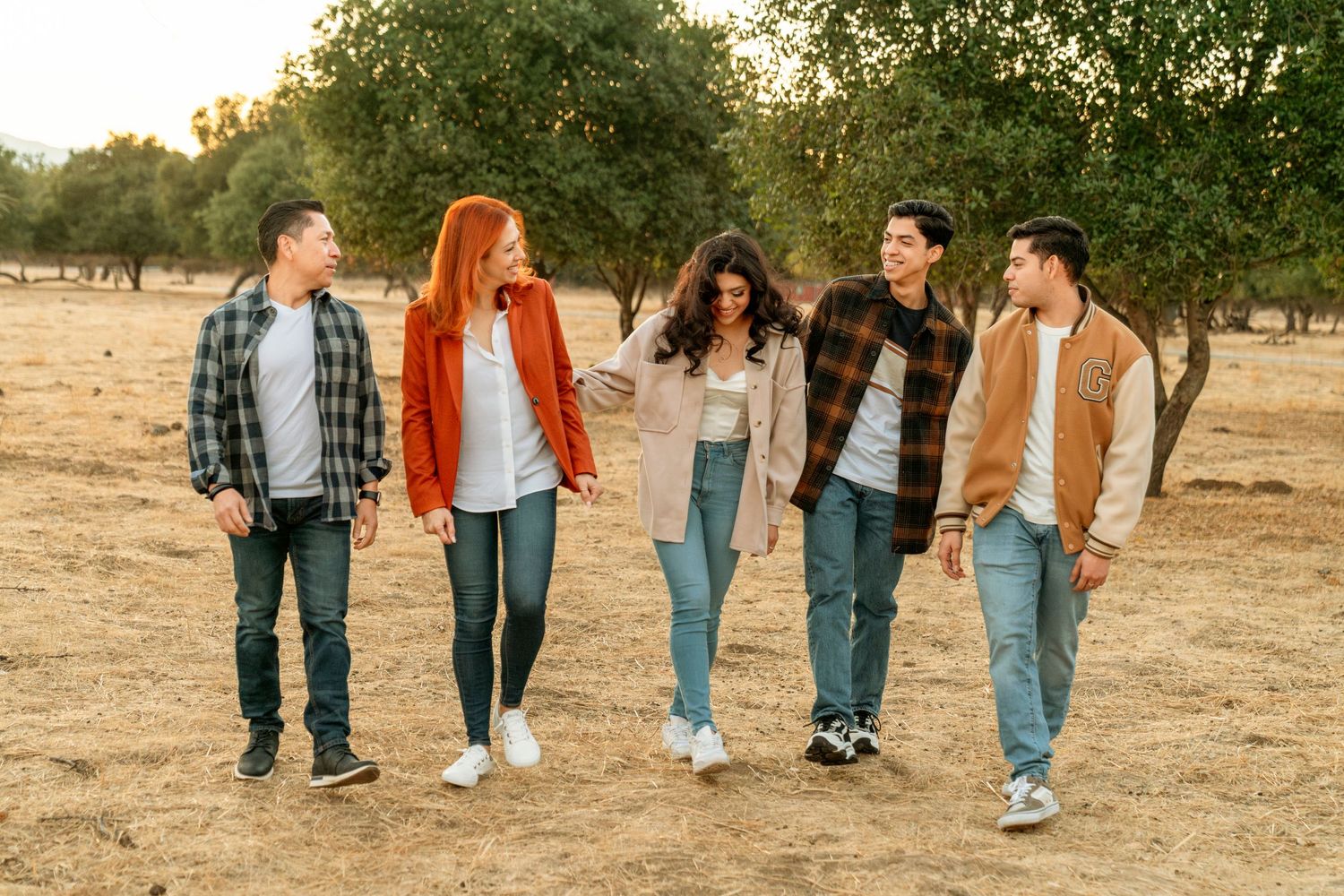 Group of friends walking together and laughing, lina alvarez photography, newborn baby photography at morgan hill california