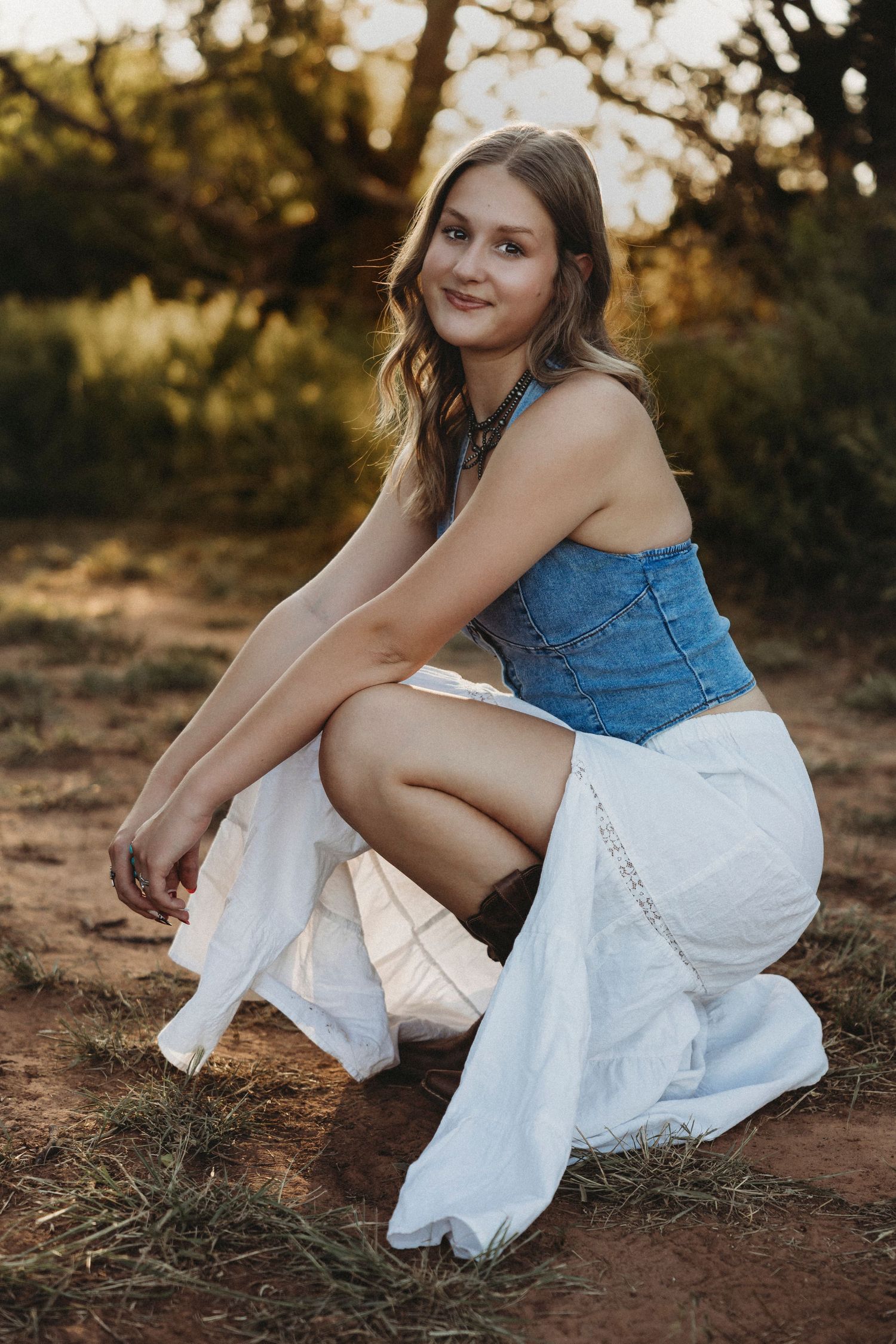 Western senior portraits in Buffalo Gap, Texas featuring a Class of 2027 high school senior at golden hour.