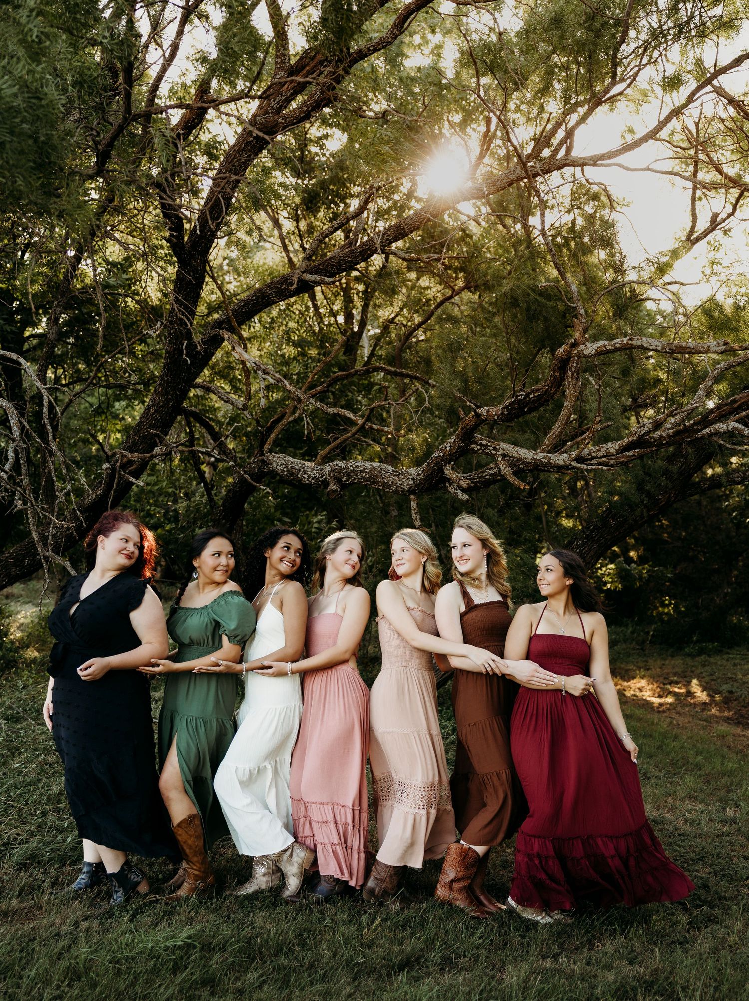 High School senior rep team under the glow of golden hour sunset senior photo session in Abilene, Texas