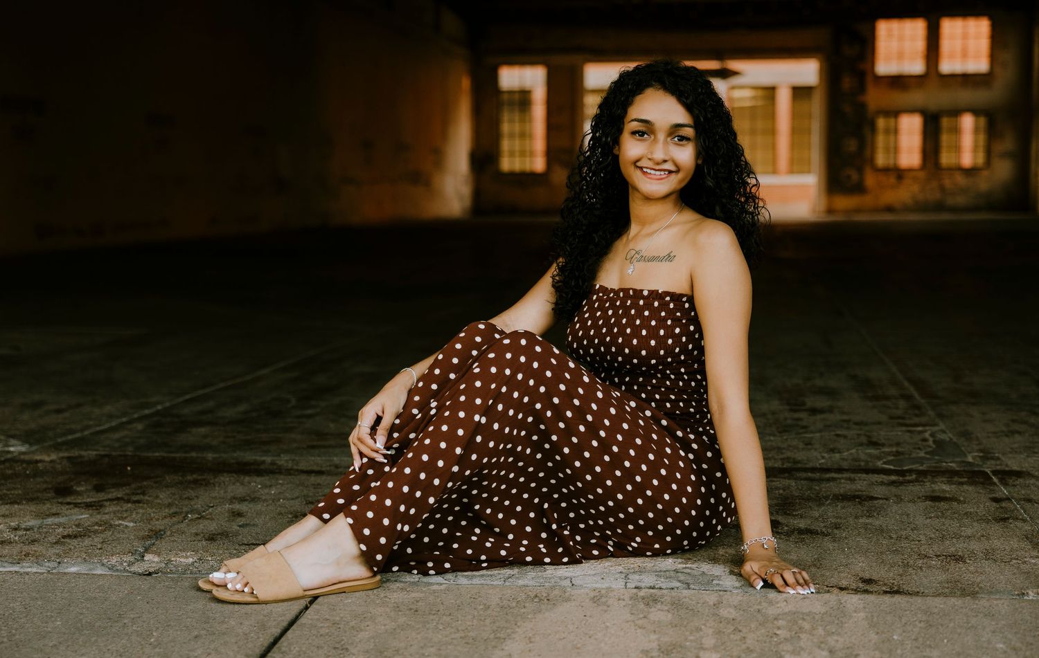 Class of 2027 Cooper High School senior posing at dusk in downtown Abilene during an outdoor senior photography session.