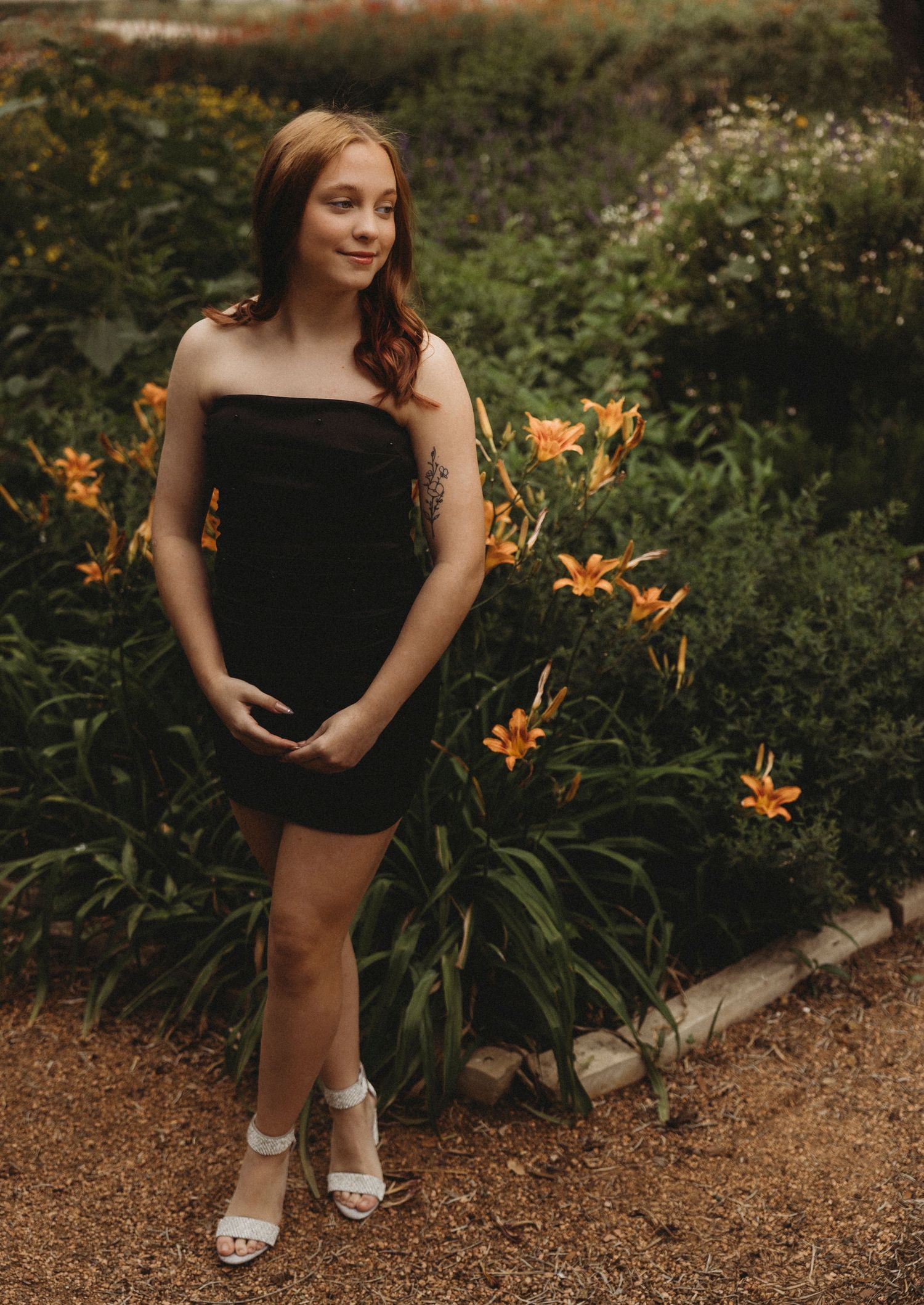 Senior girl portrait session in a garden setting in Abilene, TX.
