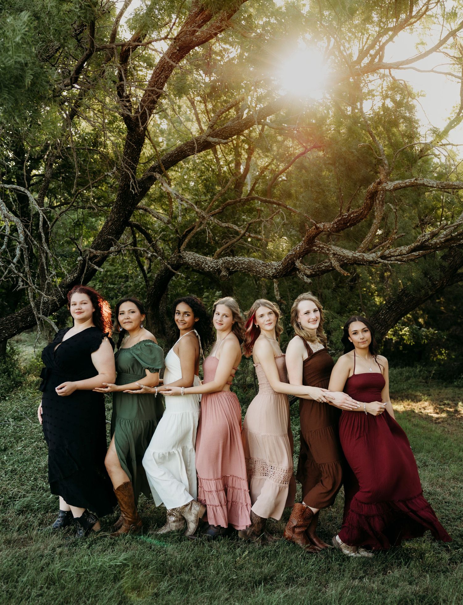 High School senior rep team under the glow of golden hour sunset senior photo session in Abilene, Texas