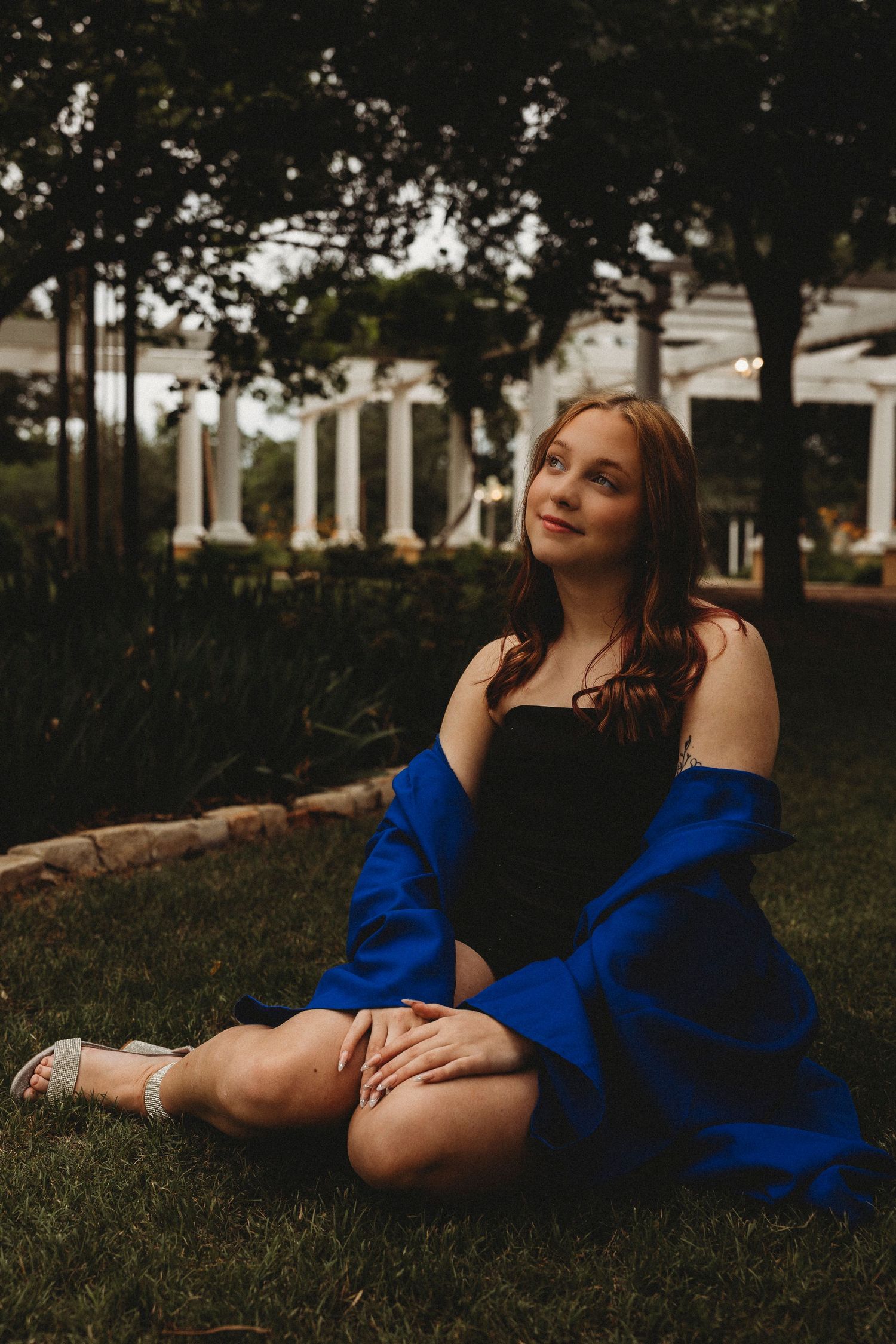 Outdoor senior photos in Abilene, TX featuring a cinematic golden hour portrait.