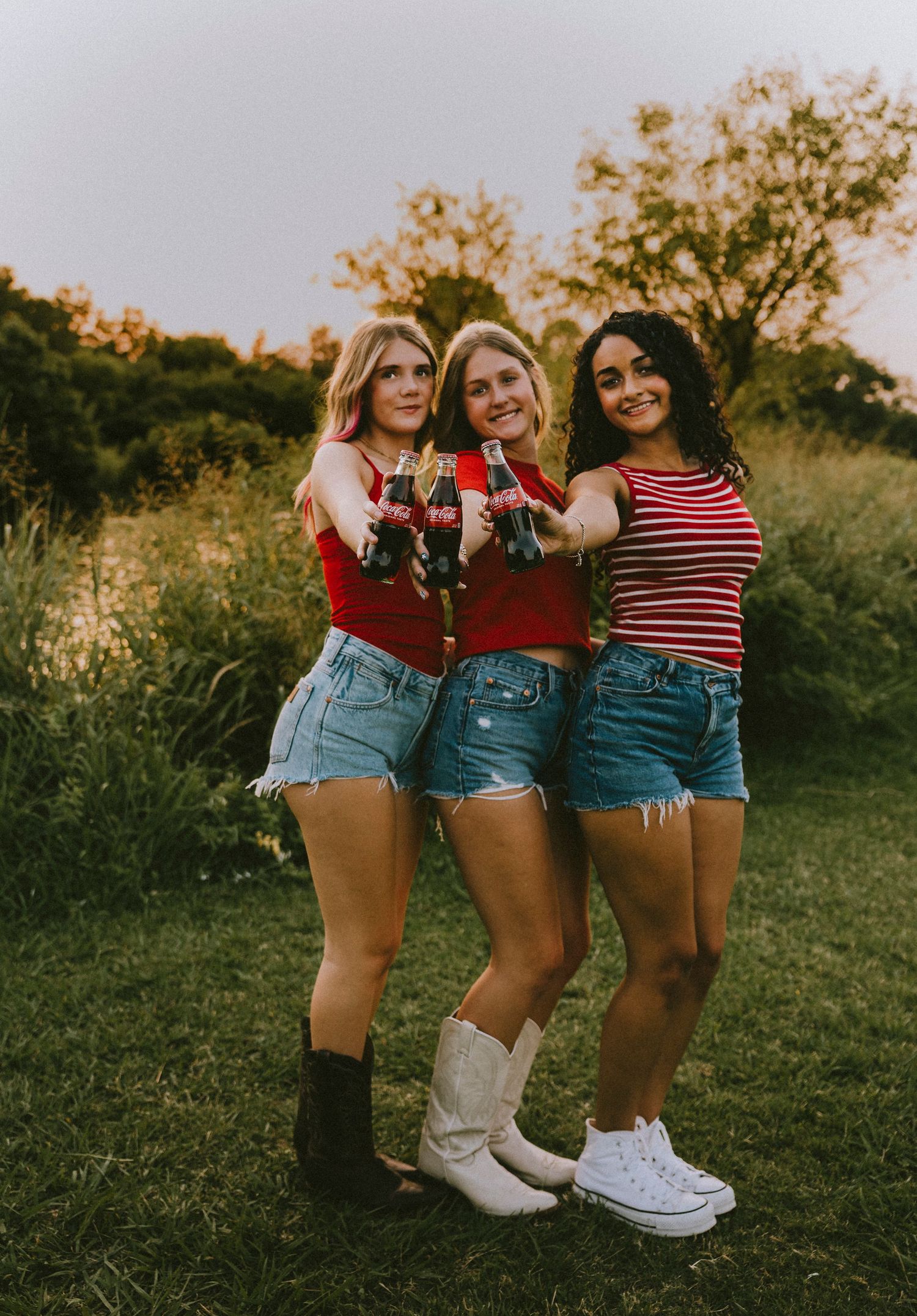 Fourth of July 250th American photoshoot at sunset in Abilene, Texas with coca-cola and Texas boots