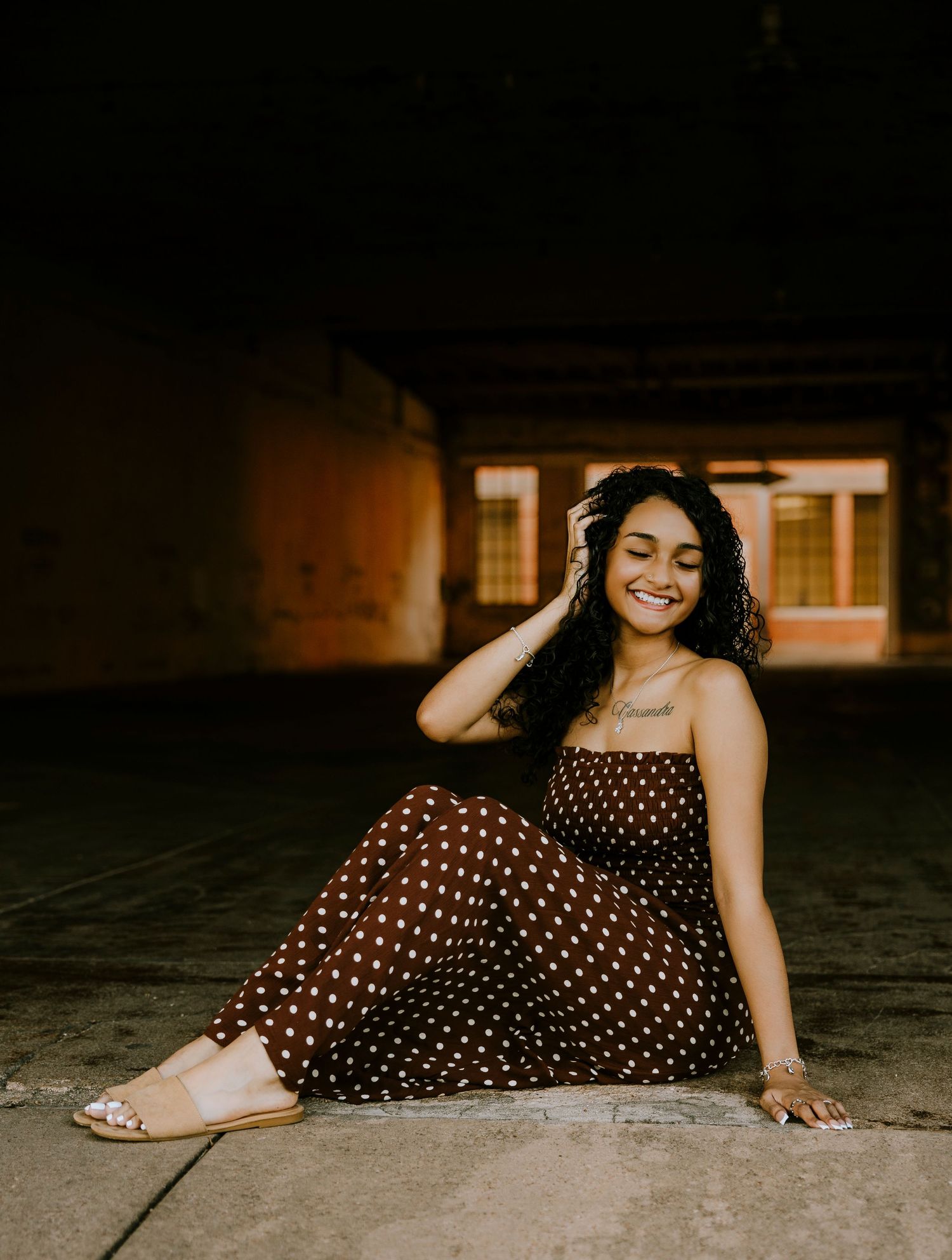 Class of 2027 Cooper High School senior posing at dusk in downtown Abilene during an outdoor senior photography session.