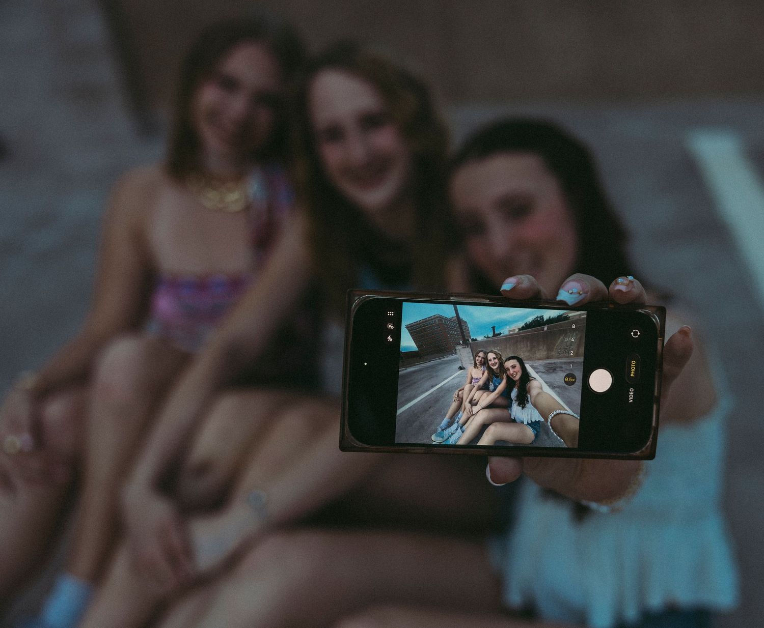 Best friends taking photos together during a downtown Abilene senior session