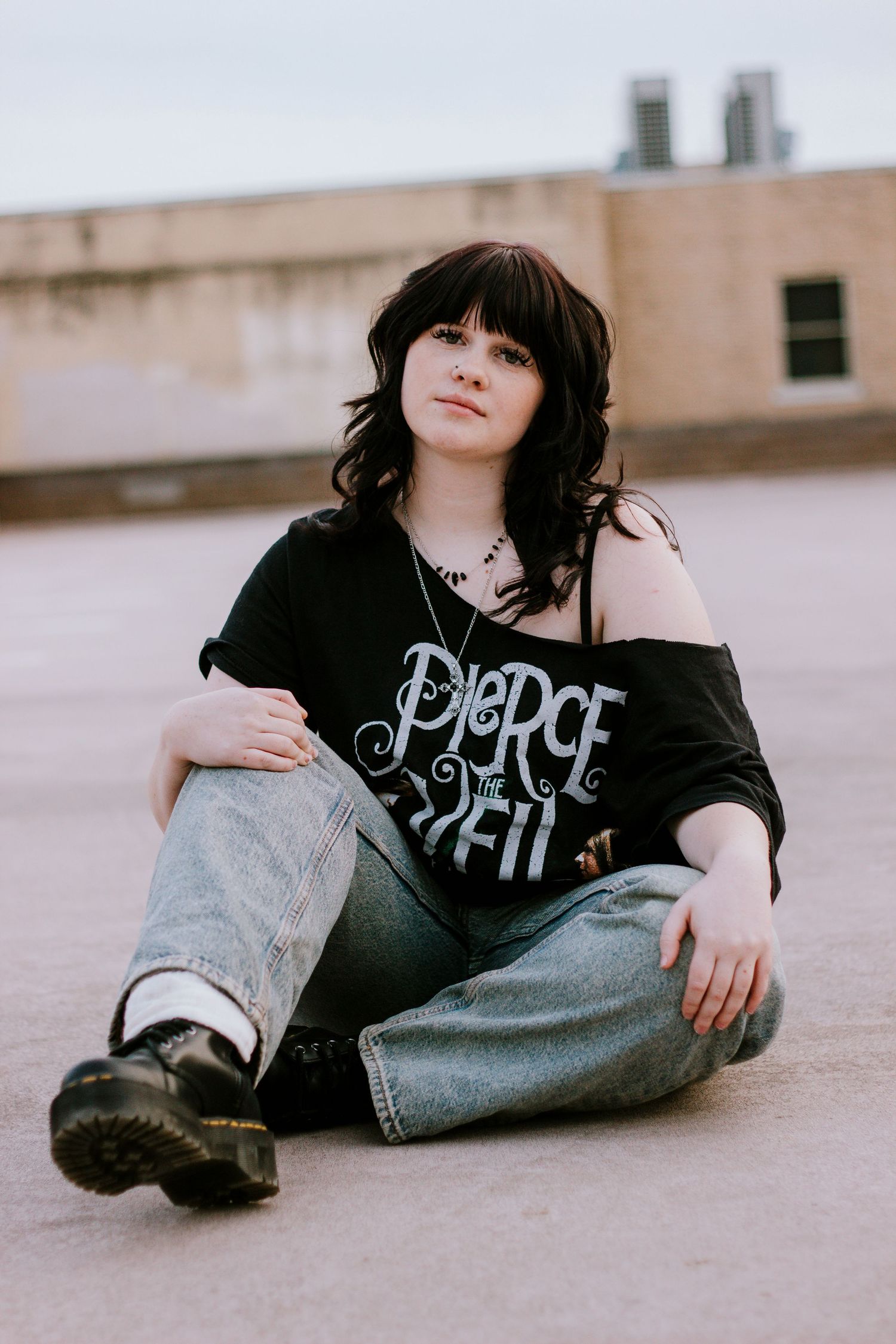 Alternative senior photoshoot on top of parking garage in Abilene TX
