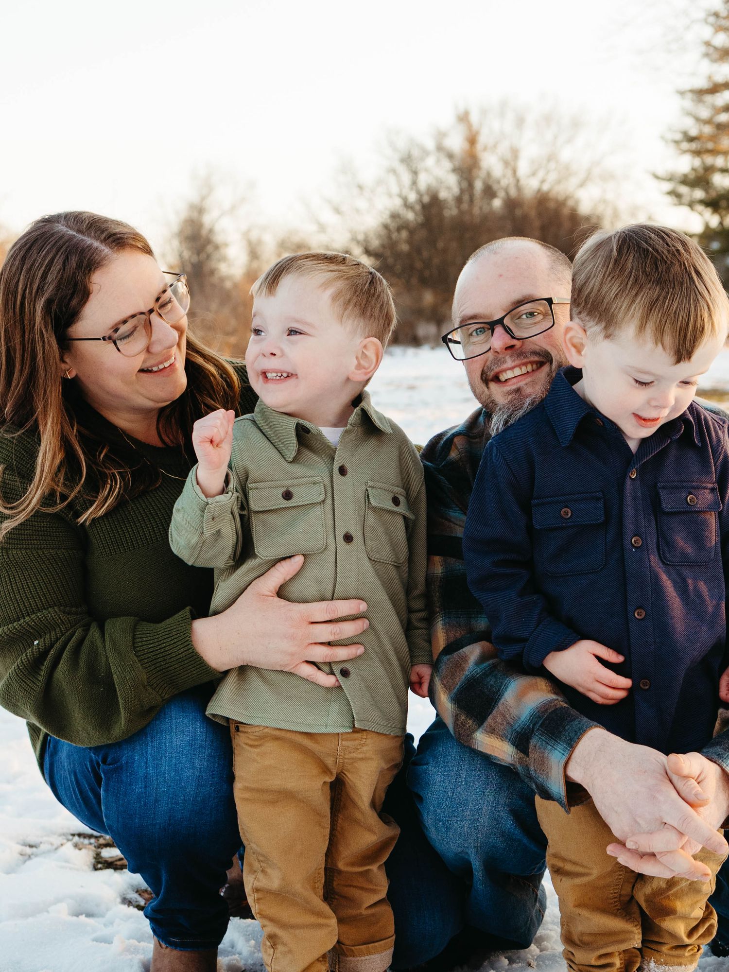 Outdoor family photoshoot in the snow with twins in St. Louis Missouri