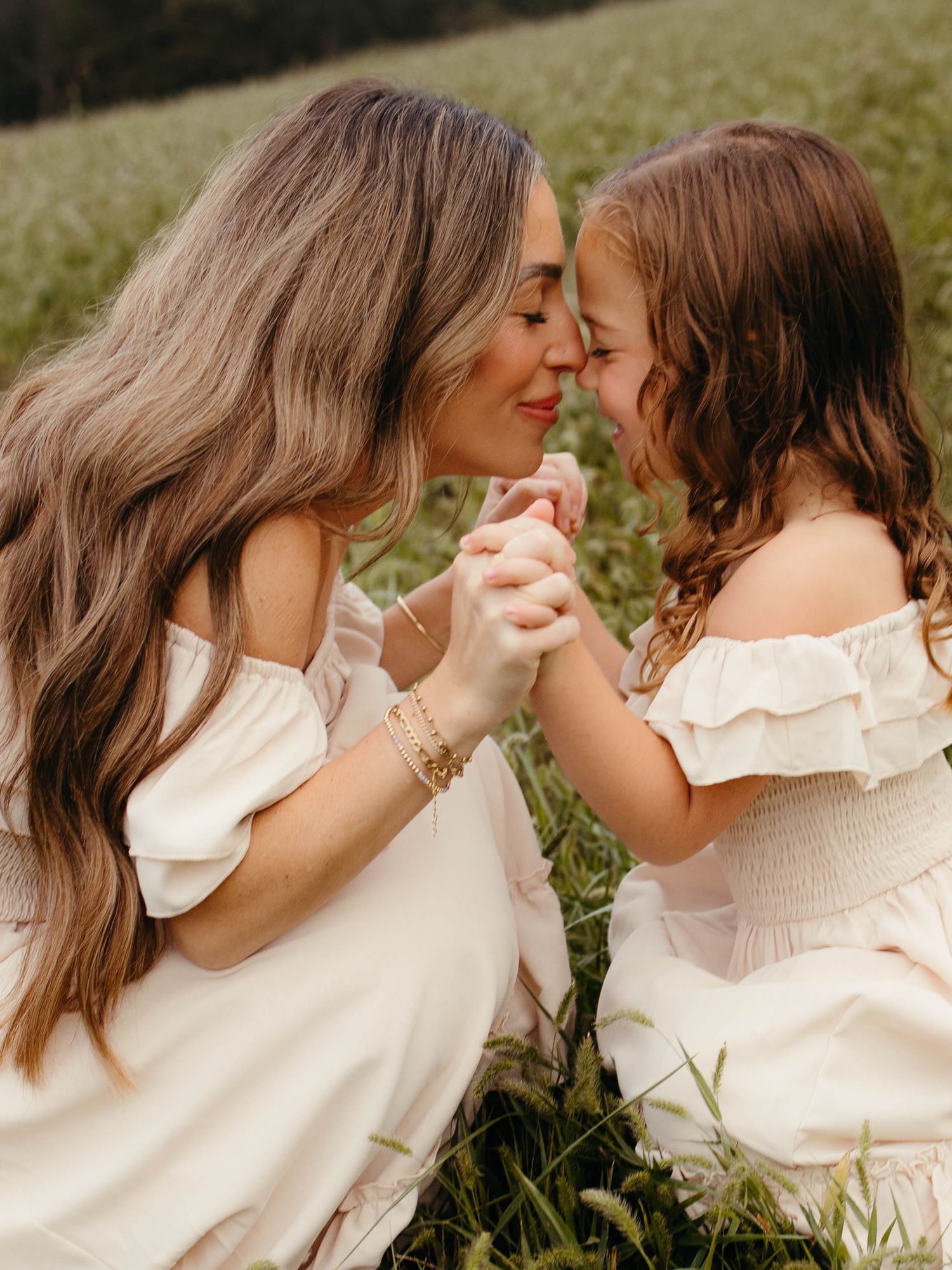 Mother and daughter fall photoshoot in the open field in St. Louis Missouri