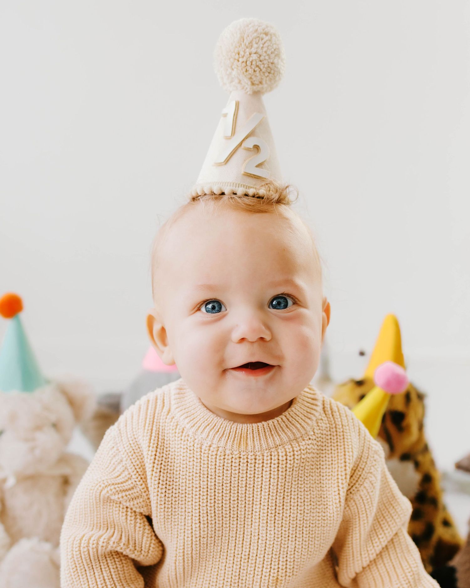 Six month baby milestone photoshoot in white studio- St. Louis studio photography