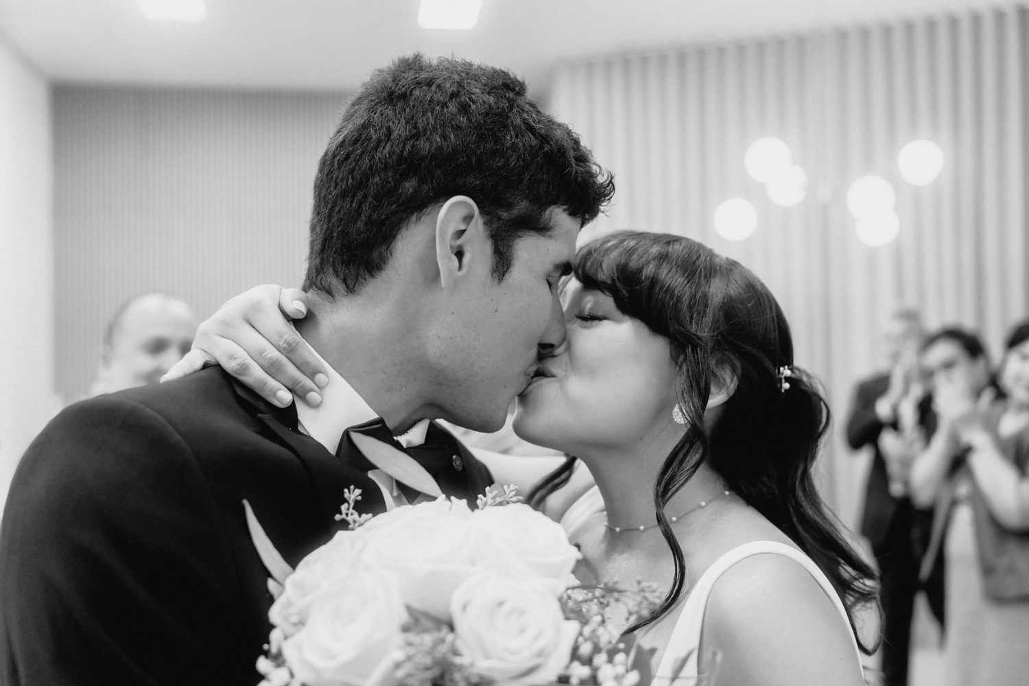 Black and white sequence of a romantic first dance at a wedding reception.
